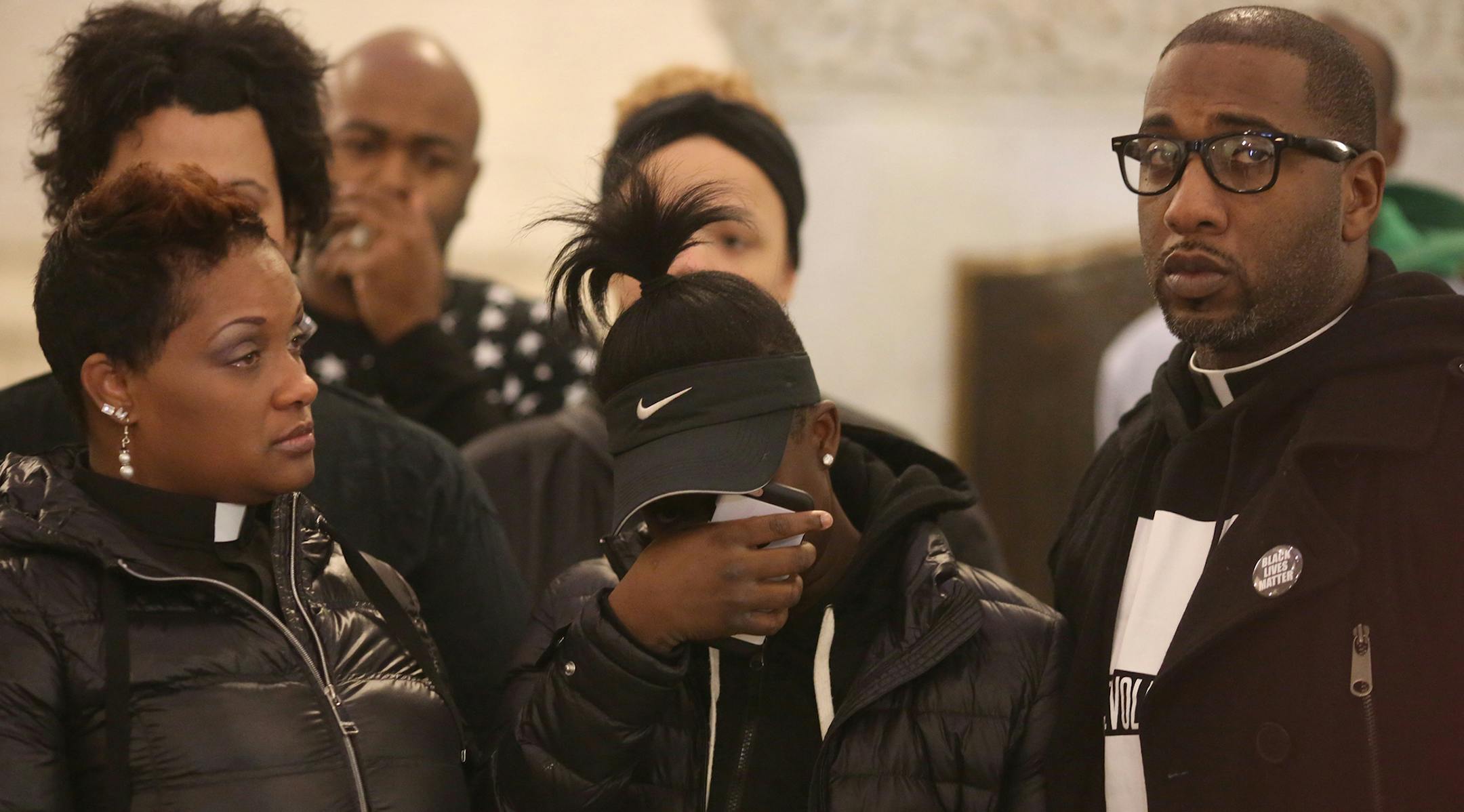 With her mother, Marea Perry co pastor Above Every Name Ministry, on the left and co pastor Danny Givens on the right Isabella Brown, 14, wiped the tears from her eyes during press conference about how she was restrained by MOA security and Bloomington Police. ] (KYNDELL HARKNESS/STAR TRIBUNE) kyndell.harkness@startribune.com Minneapolis NAACP along with Black Lives Matter and black clergy held a press conference demanding an apology from Mall of America and reiterating their call for a boycott