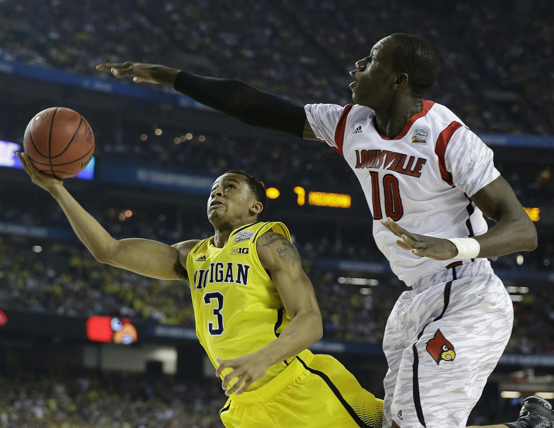 Gorgui Dieng (10) blocks a shot by Michigan's Trey Burke during the NCAA tournament.