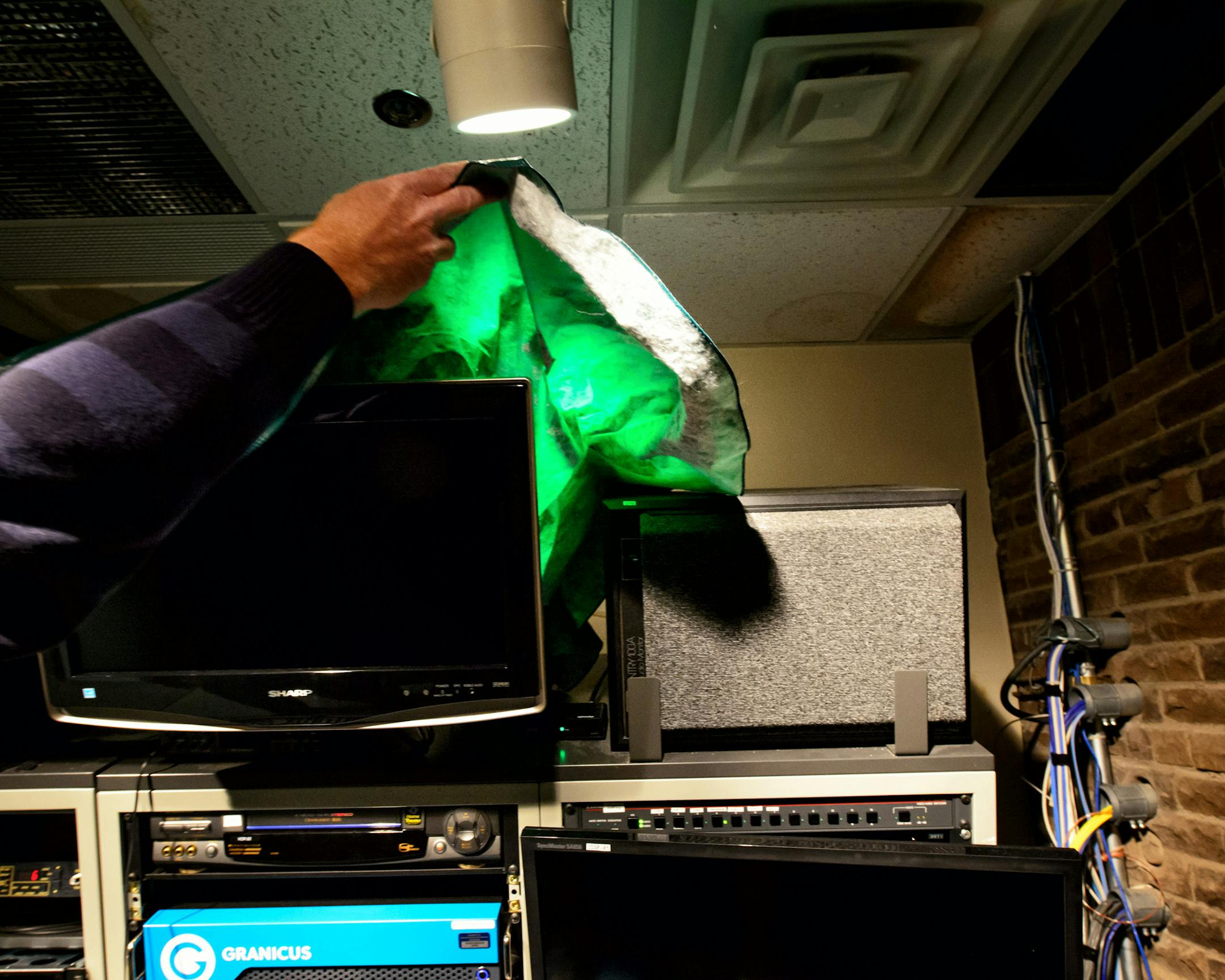 Expensive video equipment has to be covered by an old plastic tablecloth to keep it dry at New Hope City Hall. ] GLEN STUBBE * gstubbe@startribune.com Friday, November 20, 2015 New Hope City Hall is a classic 1960s split level with all the accompanying problems. The 1968 building is full of low ceilings and cramped, awkward spaces. The mayor gave up her office years ago to make room for computer servers. We photograph Mayor Kathi Hemken @ city Hall, in the old mayors office which is now where th
