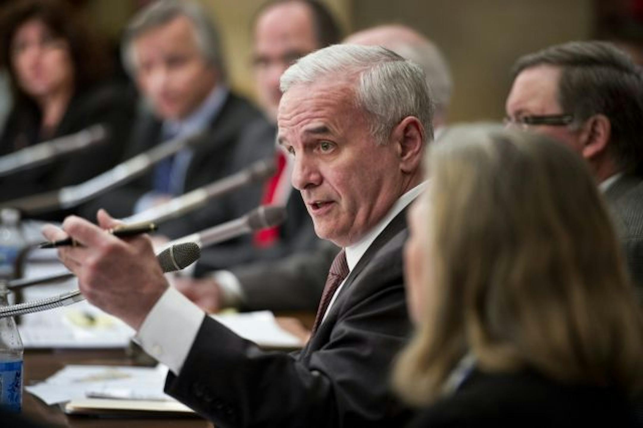 Gov. Mark Dayton asked a question during a roundtable discussion with members of the Building Jobs Coalition on Tuesday.