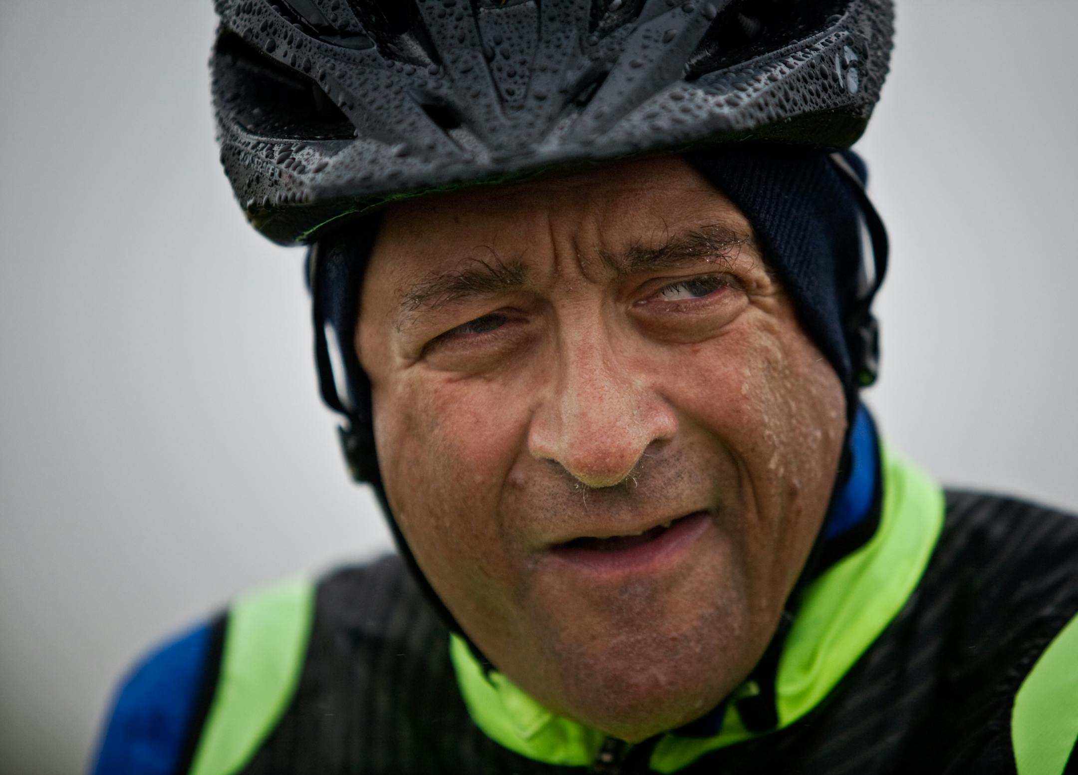 In this file photo, New York Times reporter Bruce Weber cycled past the dreary wet scene in Attica, Ohio, on Saturday, Oct. 1, 2011.