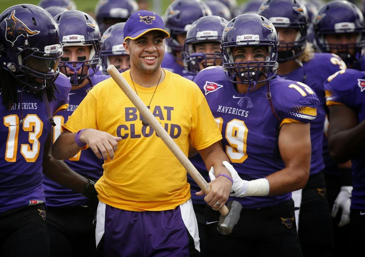 Isaac Kolstad led the Minnesota State, Mankato Mavericks football team on the field at Blakeslee Stadium before Thursday night's game vs. St. Cloud State.