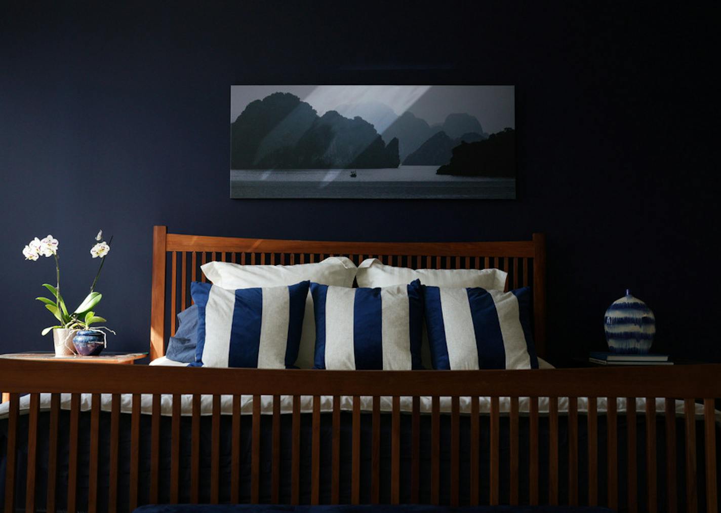 A blue bedroom designed by Sue Hunter, Home for a Change.