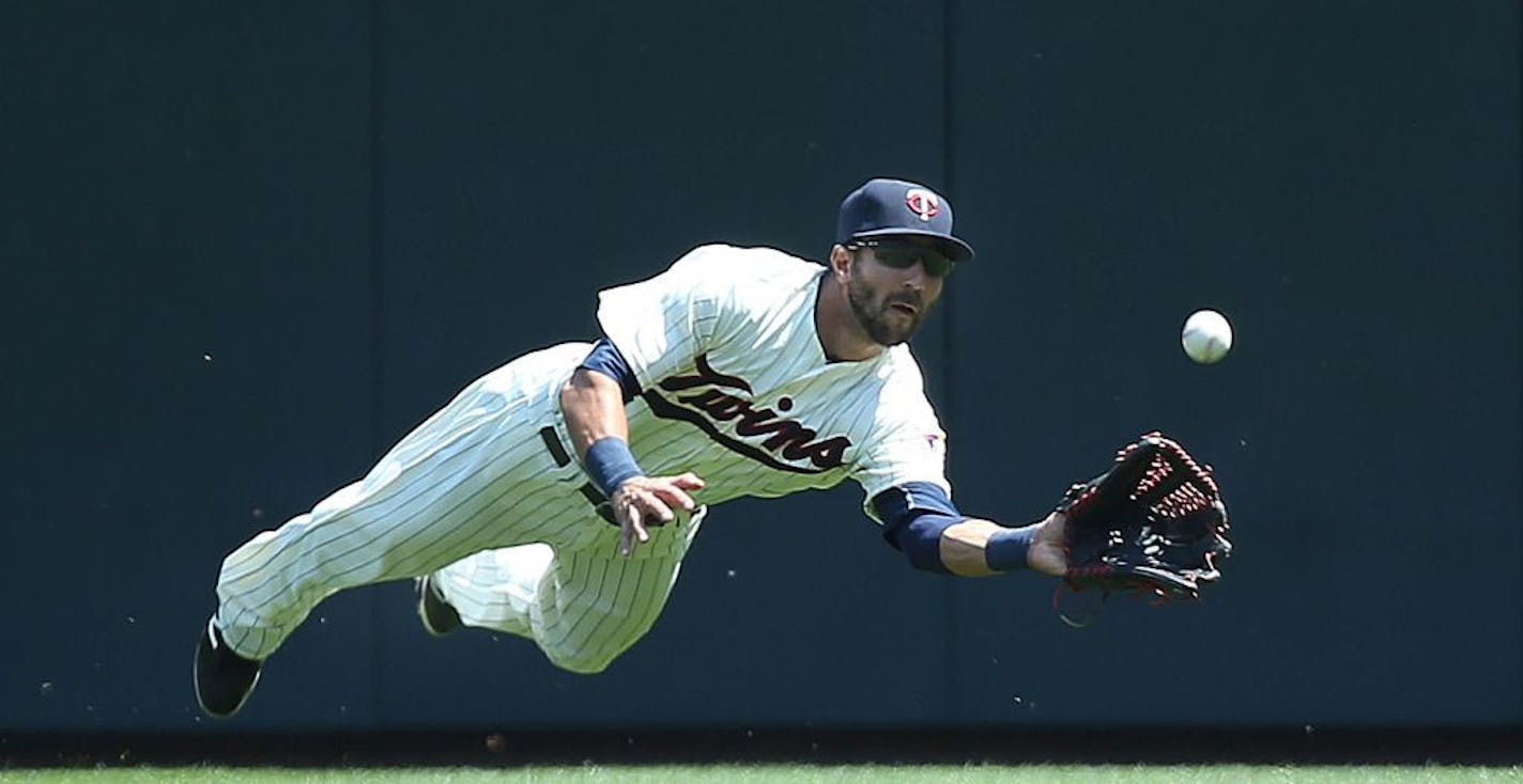 Minnesota right fielder Darin Mastroianni made a diving catch on a ball hit by Toronto's Justin Smoak in the fourth inning Saturday.