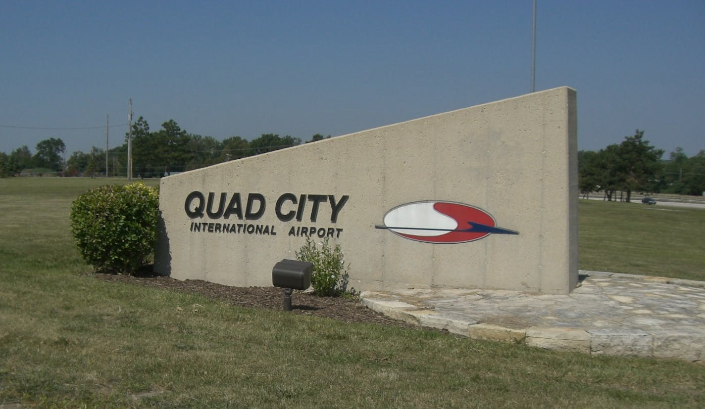 A sign greets visitors to Quad City International Airport near Moline, Ill., where Prince landed for emergency medical care.