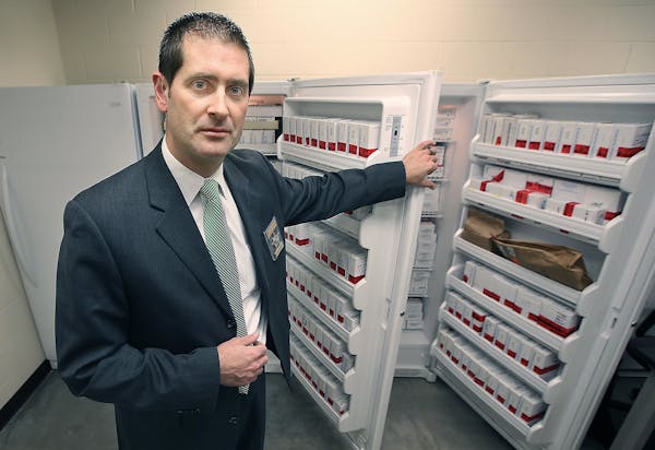 Sheriff Commander Brian Podany stood near three evidence refrigerators with 500 untested rape kits, Wednesday, December 2, 2015 in Andover, MN. ] (ELI