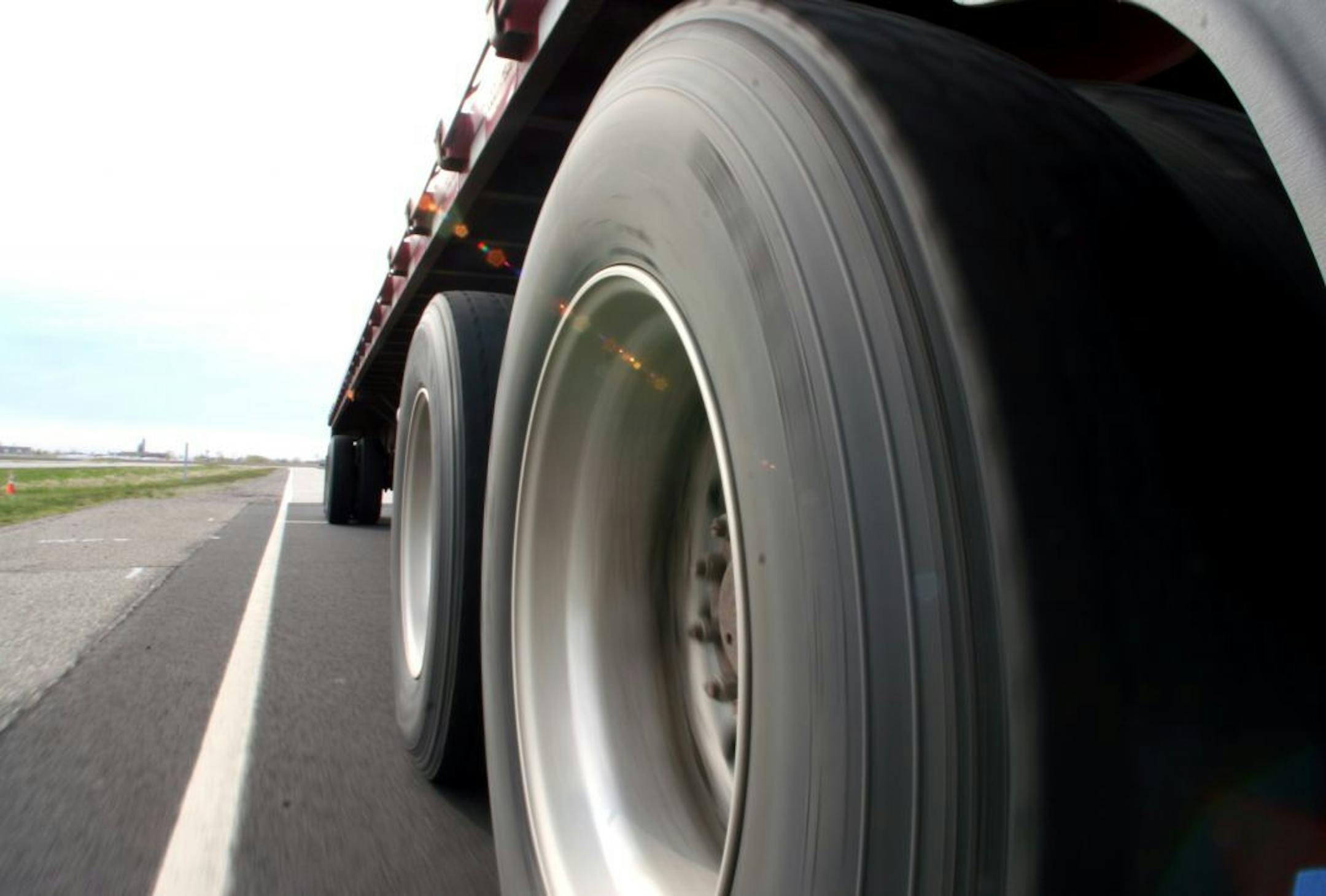 At the I-94 test site, these and the other tires of this 18 wheeler, run 40 hours a week over aggregate material made from taconite tailings. GENERAL INFORMATION: Duane Braley/Star Tribune--Albertville, Mn., Thurs., May 5, 2005--At the MnRoad research station a semi-truck runs an enclosed circuit over different patches of road surfacing material. This is only one of the tests carried out by this testing facility.