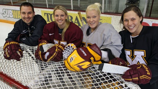 Gophers women's hockey coach Brad Frost, forward Amanda Kessel, goalie Noora Raty and defender Megan Bozek.