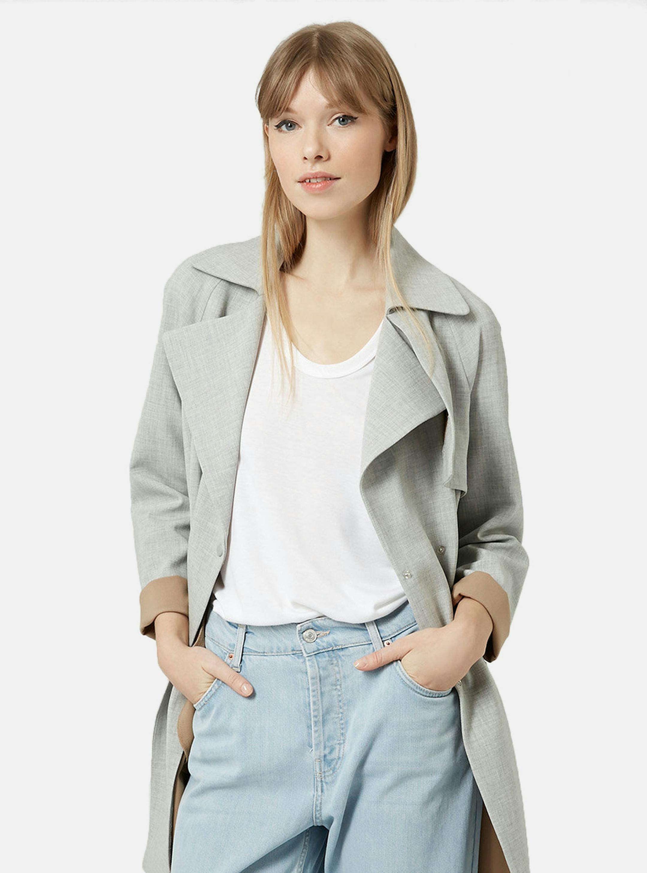 A soft trench is a key look for late summer into fall. Topshop double-breasted trench coat in gray with contrast camel lining, $160, nordstrom.com. (Nordstrom) ORG XMIT: 1172542