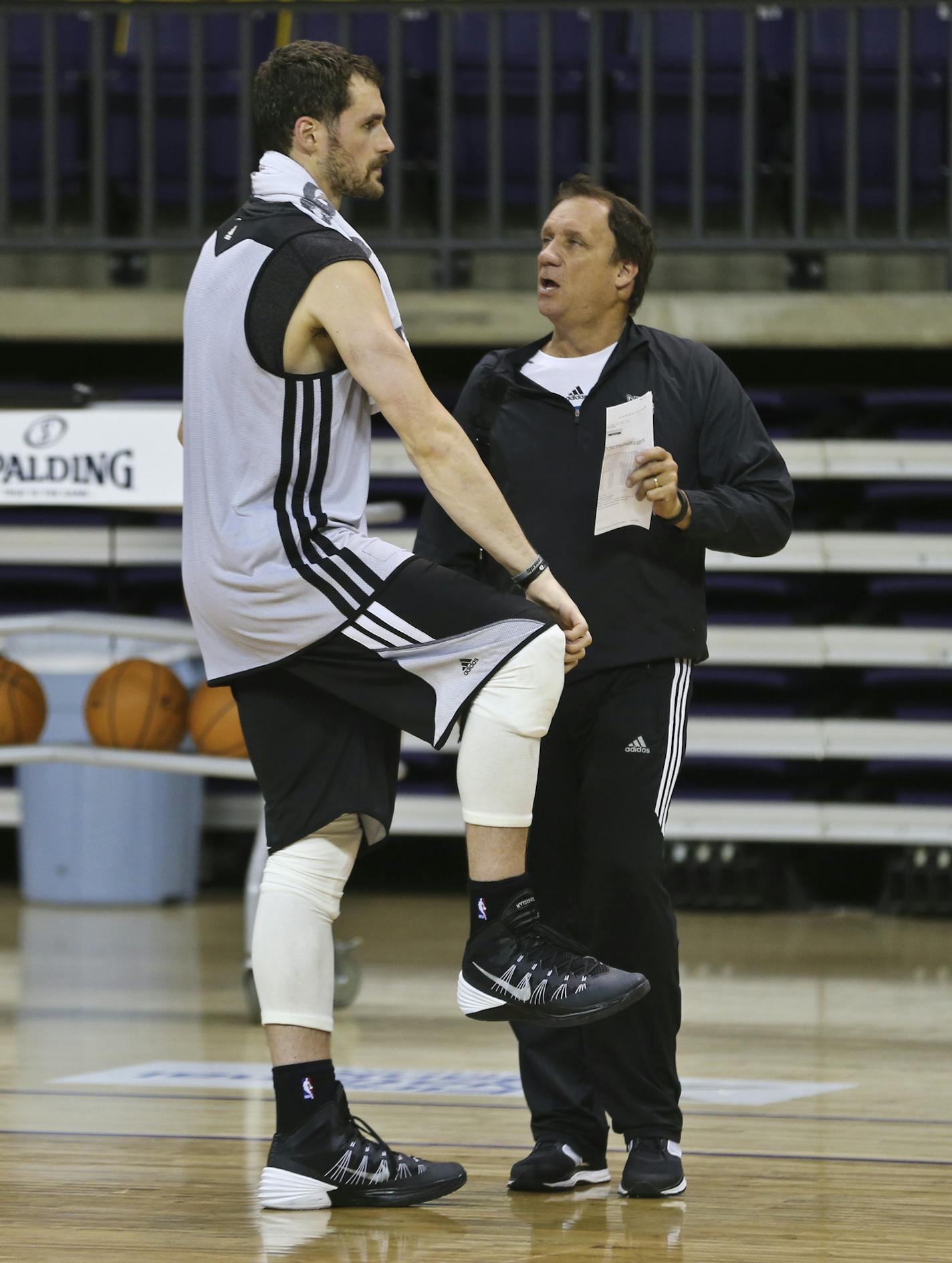 Kevin Love talked to Flip Saunders during training camp in Mankato last October.