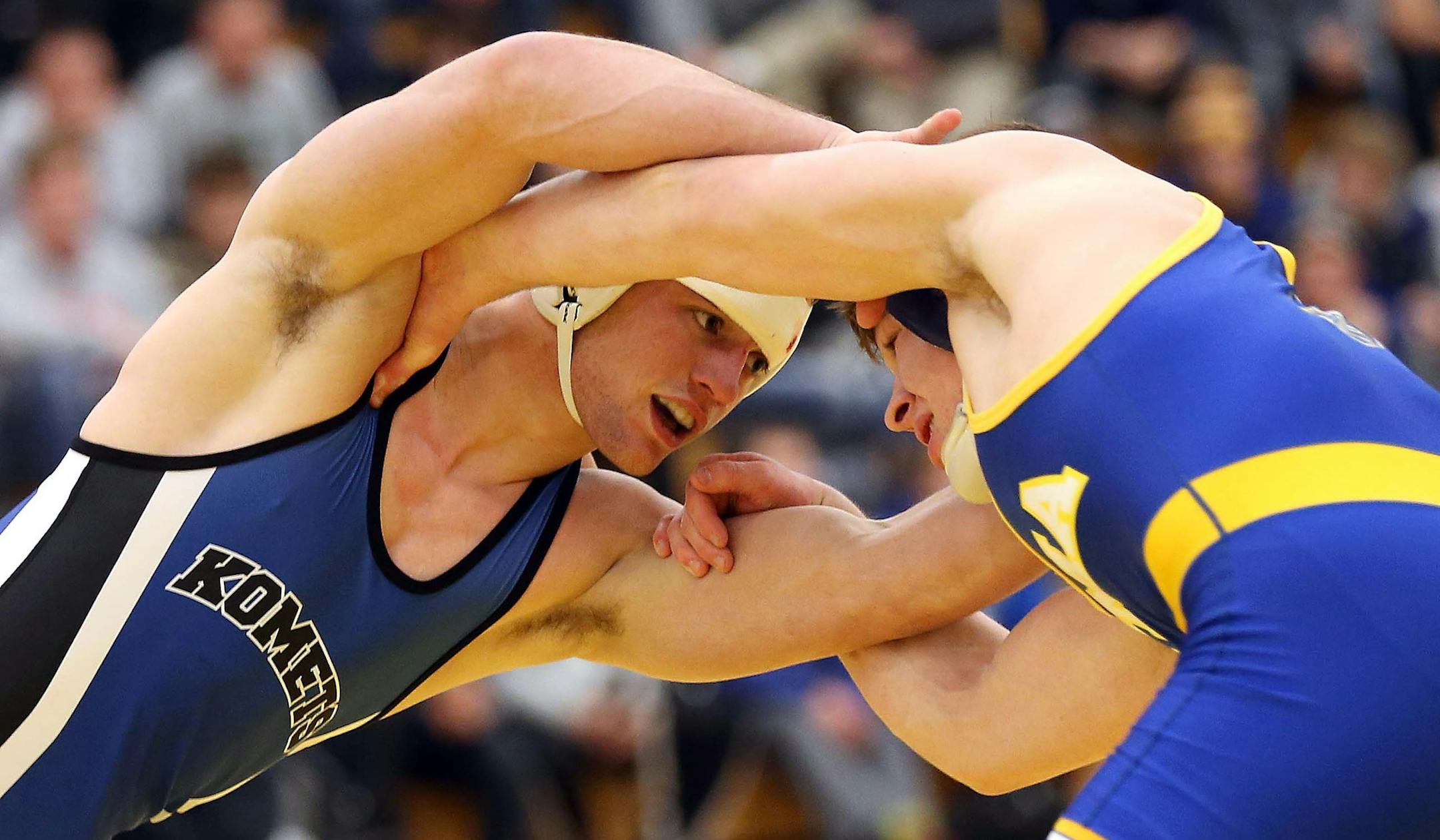 Kasson-Mantorville 160-pounder Brady Berge (left, battling St. Michael-Albertville's Jake Allar) has recovered from a broken leg suffered in last year's state tournament. He's ranked No. 1 in the country.
