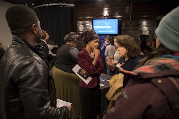 Rep. Ilhan Omar chatted with Sen. Patricia Torres Ray at a forum at Mixed Blood Theatre aimed at providing residents of her House district "the necess