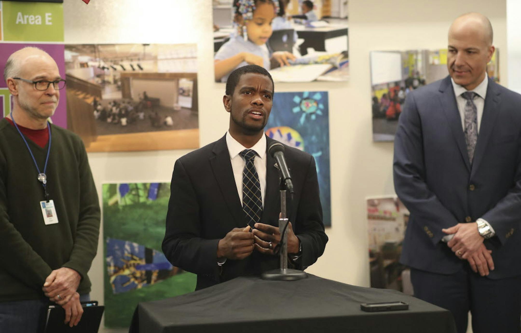 St. Paul Mayor Melvin Carter flanked by SPFT union president Nick Faber, left and Superintendent Joe Gothard spoke about the St. Paul Federation of Teachers reaching an tentative agreement early Monday, averting a strike that was scheduled to start on Tuesday at Galtier Community School Monday Feb 12, 2018 in St. Paul, MN.] JERRY HOLT ï jerry.holt@startribune.com ORG XMIT: MIN1802121629521025