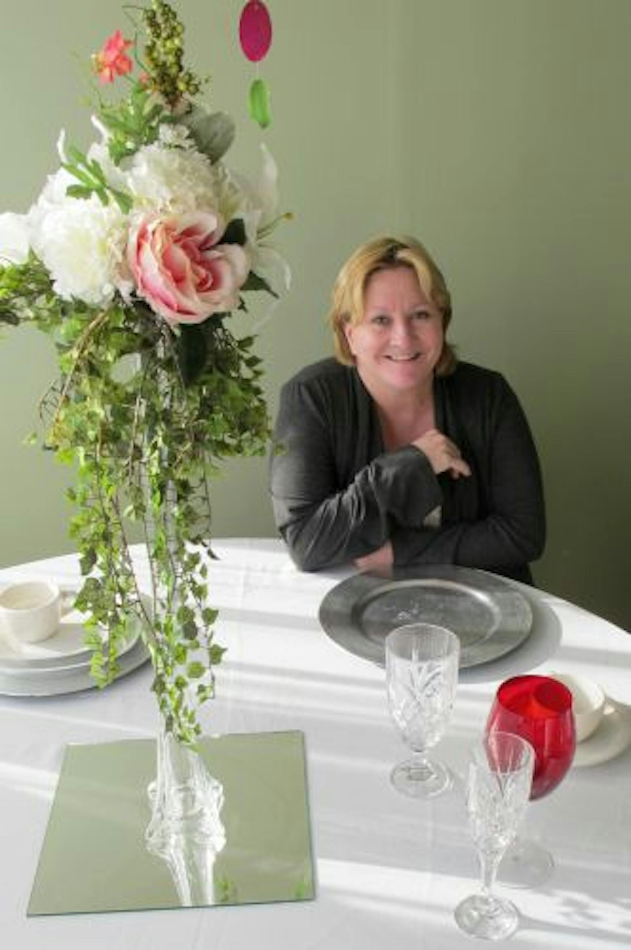 Provided photoPam Docken sits at one of the tables inside the 2900 Event Hall in Little Canada where the Funside Dinner Theatre relocated from its former home at the Applewood Hills Golf Club in Stillwater.