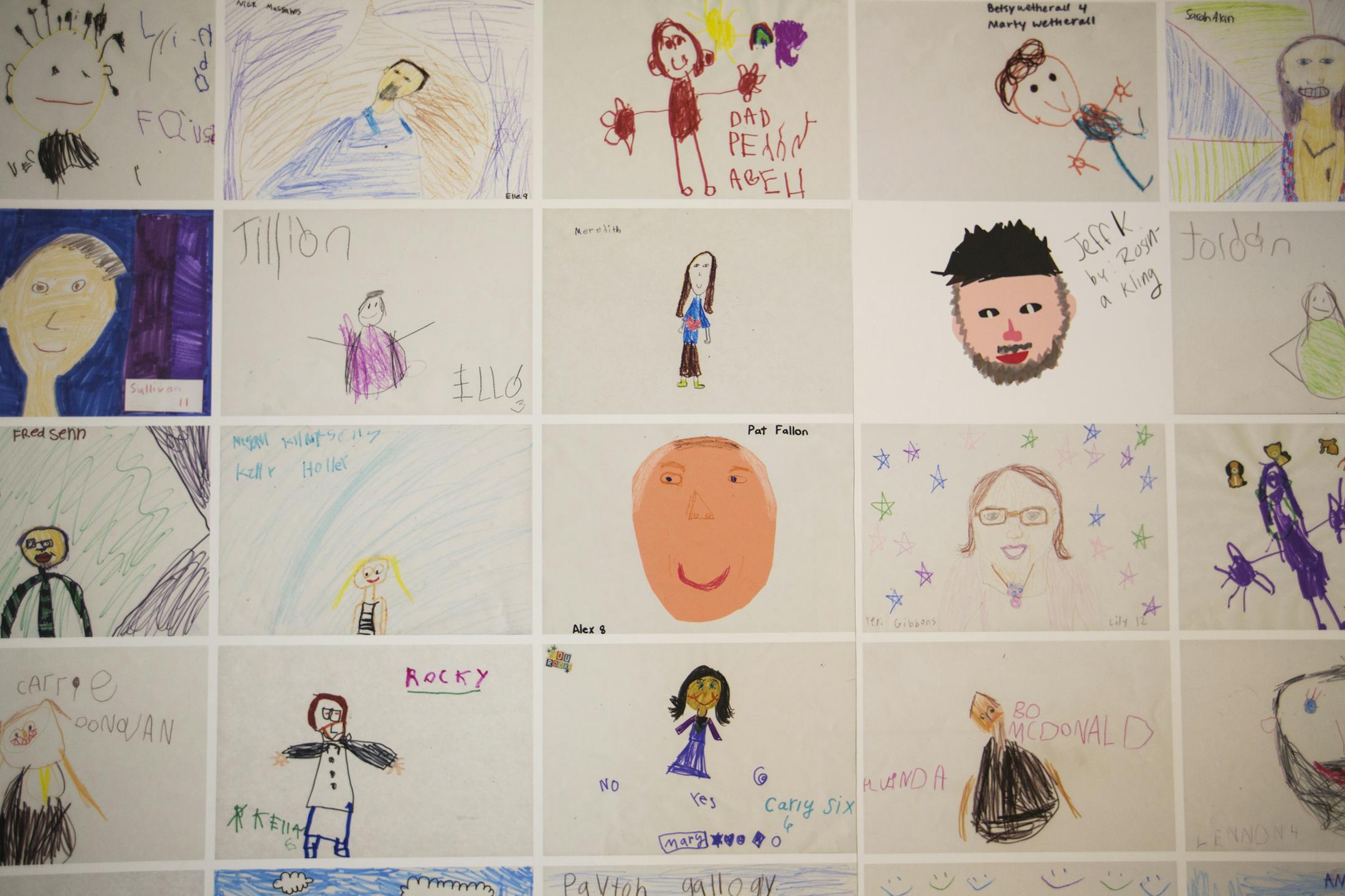 Pictures of employees are on display, including founder Pat Fallon, center, that were painted by children of employees at Fallon Agency. ] (Leila Navidi/Star Tribune) leila.navidi@startribune.com BACKGROUND INFORMATION: Fallon Advertising Agency office in downtown Minneapolis on Wednesday, August 17, 2016. As the veteran Fallon agency celebrates its 35th anniversary, we sit down with CEO Mike Buchner and talk about the direction of the agency since founder and advertising icon Pat Fallon passed