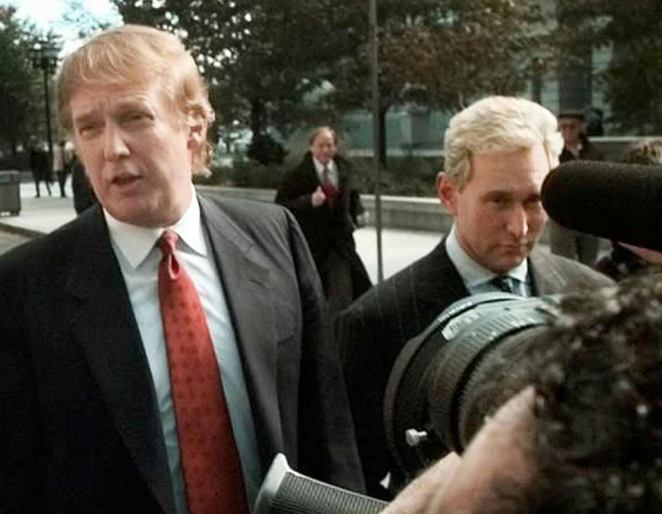 Billionaire real estate developer Donald Trump, left, is seen outside the Federal Courthouse in Newark, N.J., with Roger Stone, the director of Trump's presidential exploratory committee Monday, Oct. 25, 1999, for the swearing-in of Trump's sister as a federal appeals court judge. In a prelude to his possible presidential bid, Trump quit the Republican Party Monday and joined New York's wing of the Reform Party setting the stage for a possible presidential nomination battle with Pat Buchanan. (A