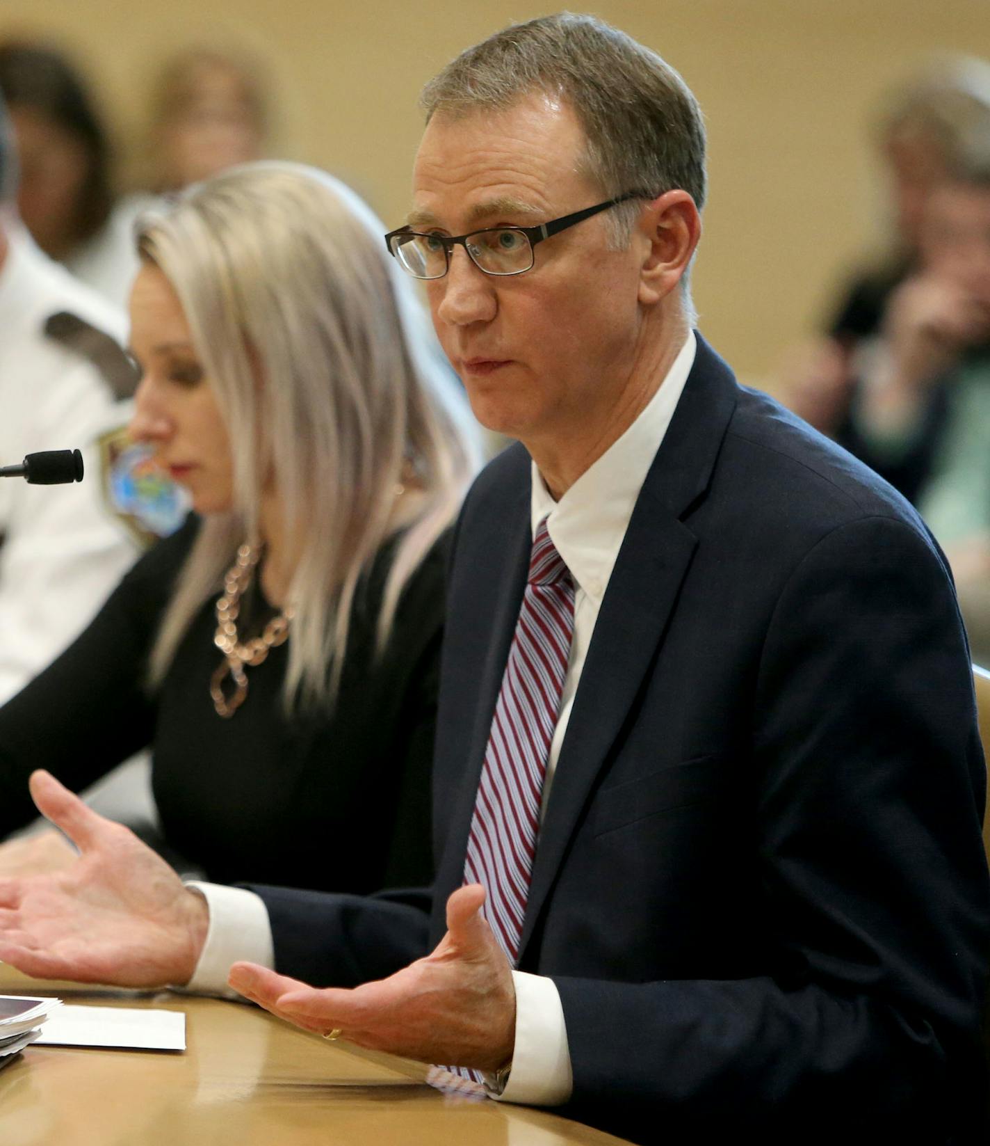 Legislative Auditor Jim Nobles released details of an evaluation into mental health services in county jails to the Senate Health and Human Services Committee Thursday, March 3, 2016, at the Minnesota Senate Building in St. Paul, MN. Here, Chuck Johnson, deputy commissioner of the Minnesota Department of Human Services, right, tries to answer questions from state senators as why the DHS does not have in place a better, more comprehensive plan for dealing with the mentally ill in jail. Seated nex