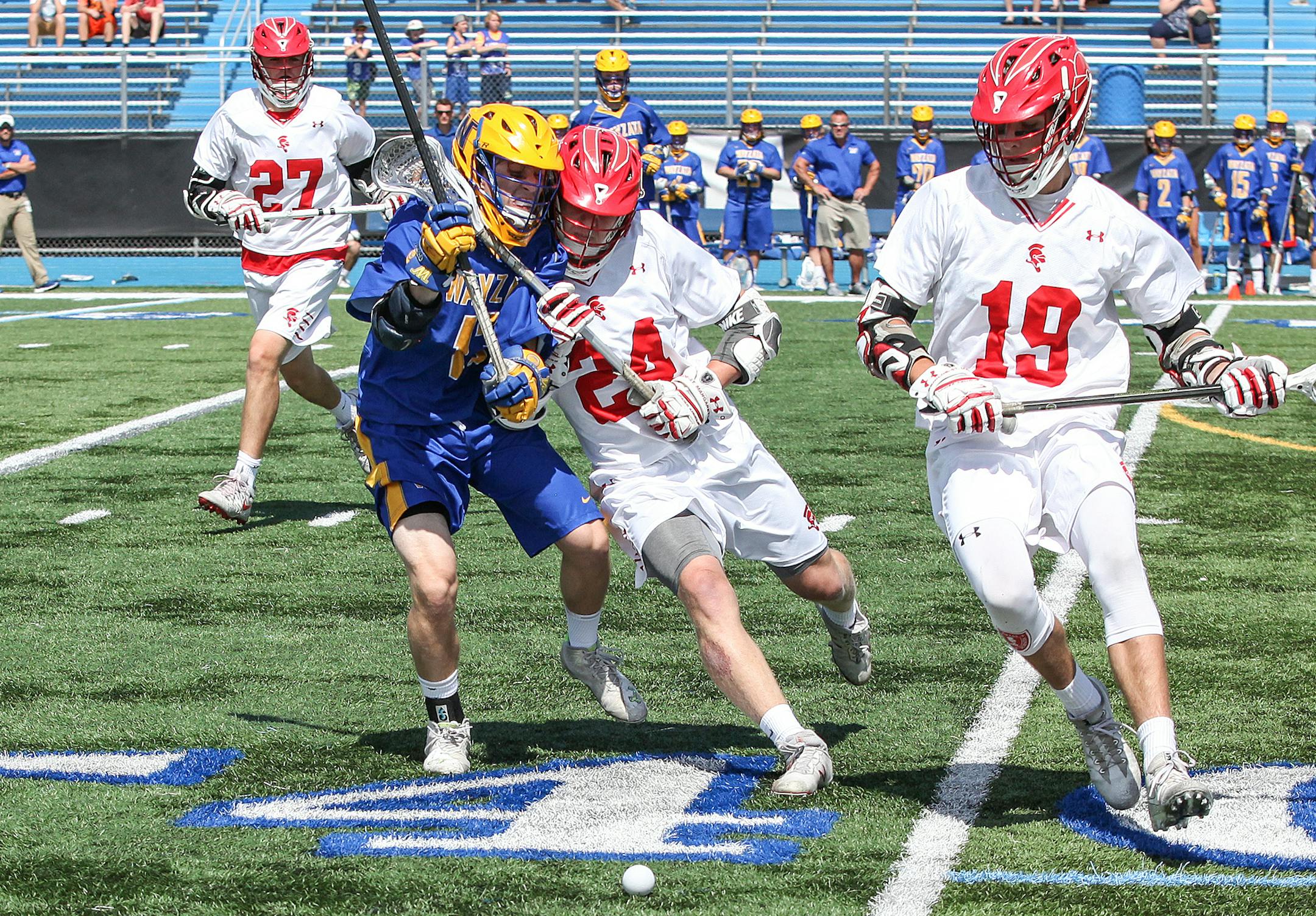 Benilde-St. Margaret's Quinn EHlen (24) checked Wayzata Luke Goetz (17) in the first quarter. ] XAVIER WANG • xavier.wtian@gmail.com Game action from the 2017 Boys' State Tournament Championship semifinals lacrosse game between Benilde-St. Margaret's and Wayzata on Thursday June 15, 2017 at Minnetonka High School in Minnetonka.