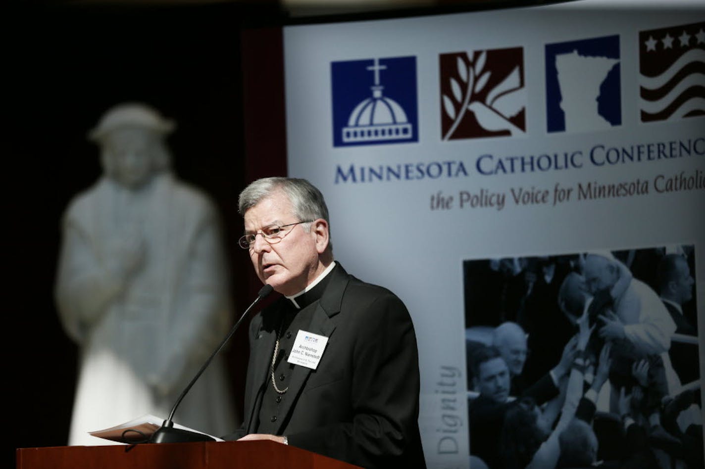 Catholic Archbishop John Nienstedt served as the host during a panel discussion Wednesday about federal immigration reform at the University of St. Thomas School of Law in Minneapolis.