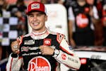 Christopher Bell celebrates in Victory Lane after winning Sunday night's Coca-Cola 600 in Concord, N.C.