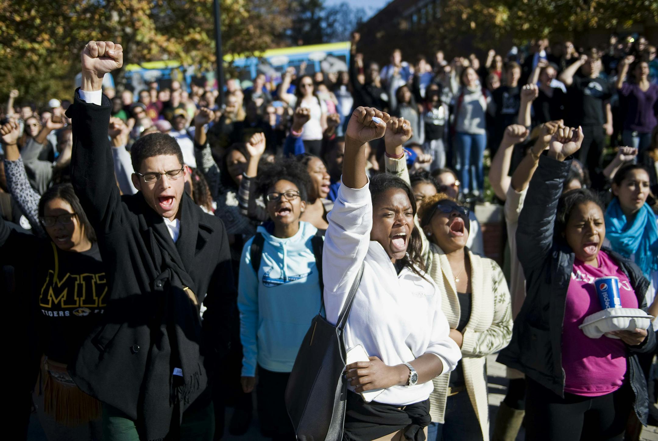 Supporters of the student protest group Concerned Student 1950 celebrate and chant following the announcement of the resignation of University of Missouri President Timothy Wolfe, on campus in Columbia, Mo., Nov. 9, 2015. Wolfe announced that he was stepping down after a wave of student outcry, including an ultimatum from dozens of black football players that they would not play if he did not resign. (Daniel Brenner/The New York Times) ORG XMIT: MIN2015111213594530