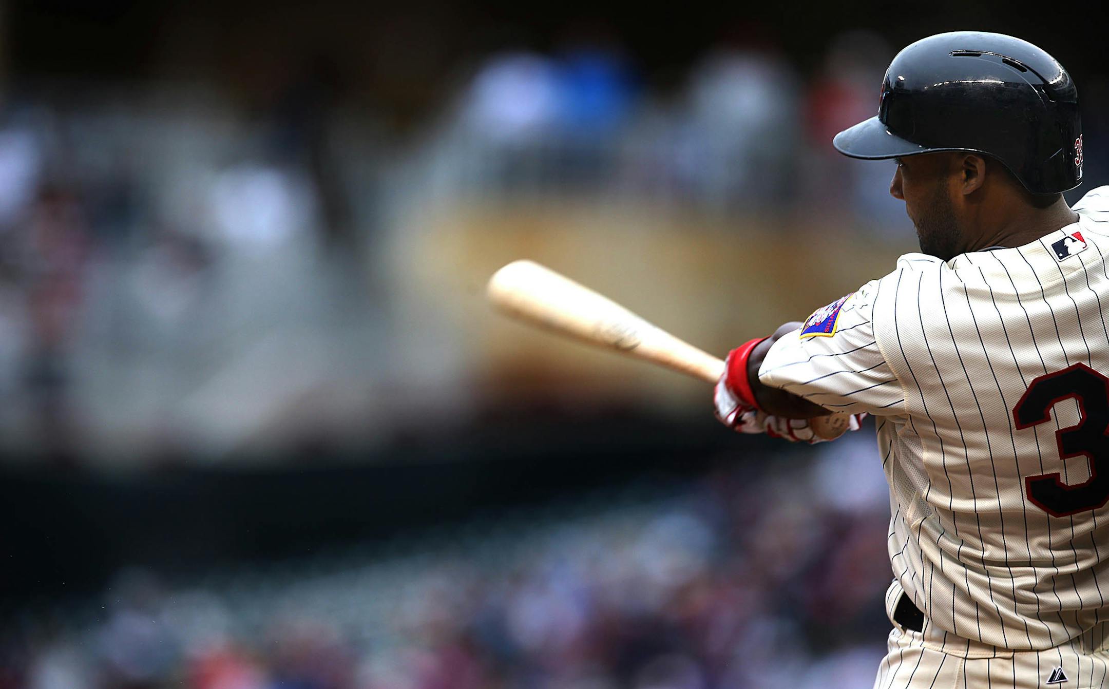 Versatile Twins rookie Danny Santana returned to the lineup Friday night after a rehab assignment for a knee bruise.