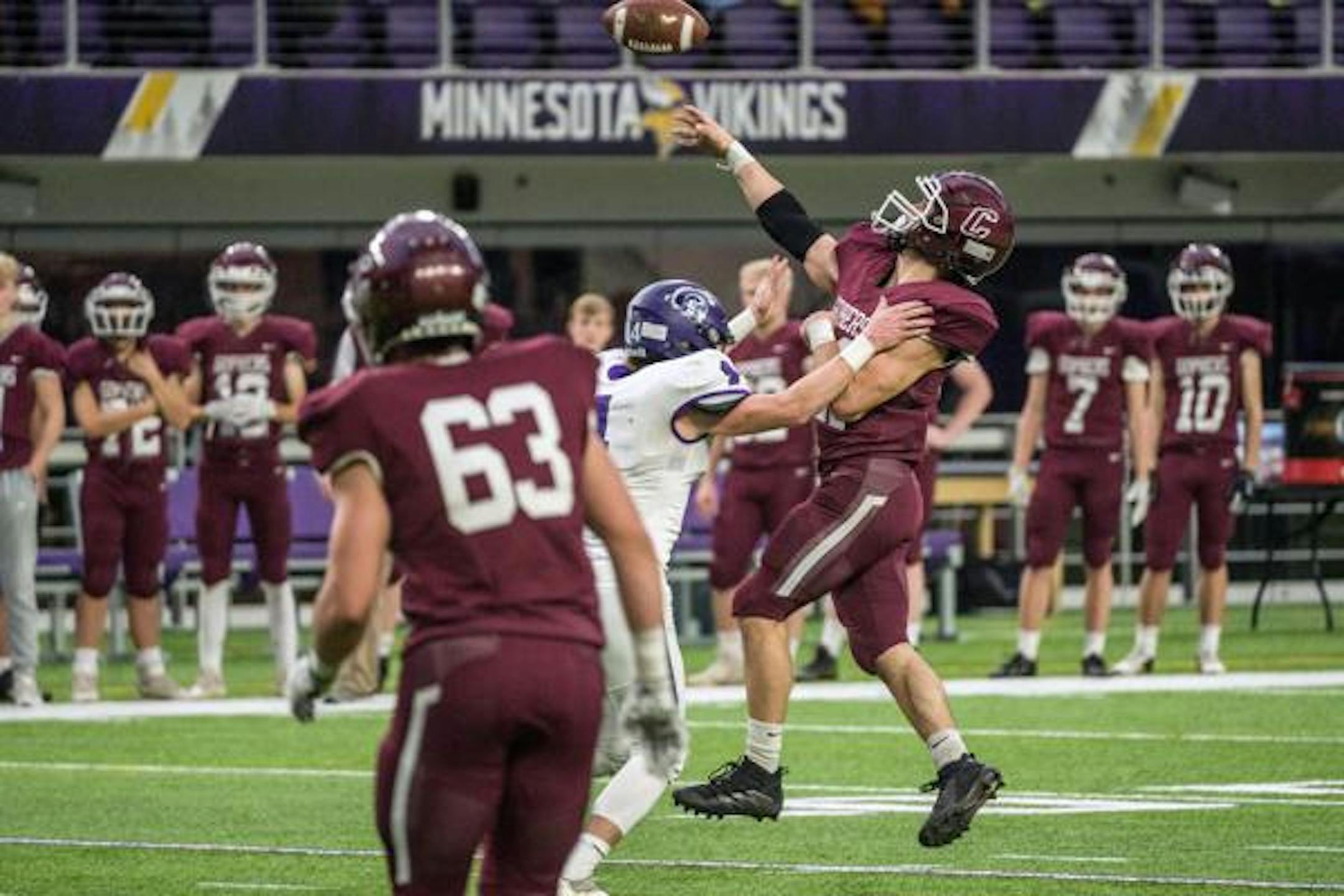 Chatfield's Sam Backer (21) passes the ball during a Class AA State Football Semifinal game against Barnesville Thursday, Nov. 18, 2021, at U.S. Bank Stadium in Minneapolis. Traci Westcott / Post Bulletin