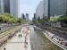 South Koreans on lunch break one afternoon last month enjoyed Cheonggyecheon, a park on a stream that cuts through the heart of Seoul. The country has