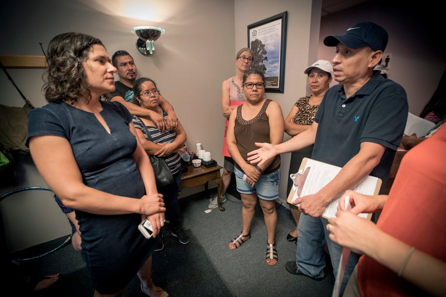 Jose Lopez, who has lived in a south Minneapolis apartment building for 25 years, pleaded for help from Council Member Lisa Bender at Nexus Real Estate Services Property office, Tuesday, August 1, 2017 in Minneapolis, MN. Council Member Bender showed up after tenants showed up to pay their rent but were turned away.