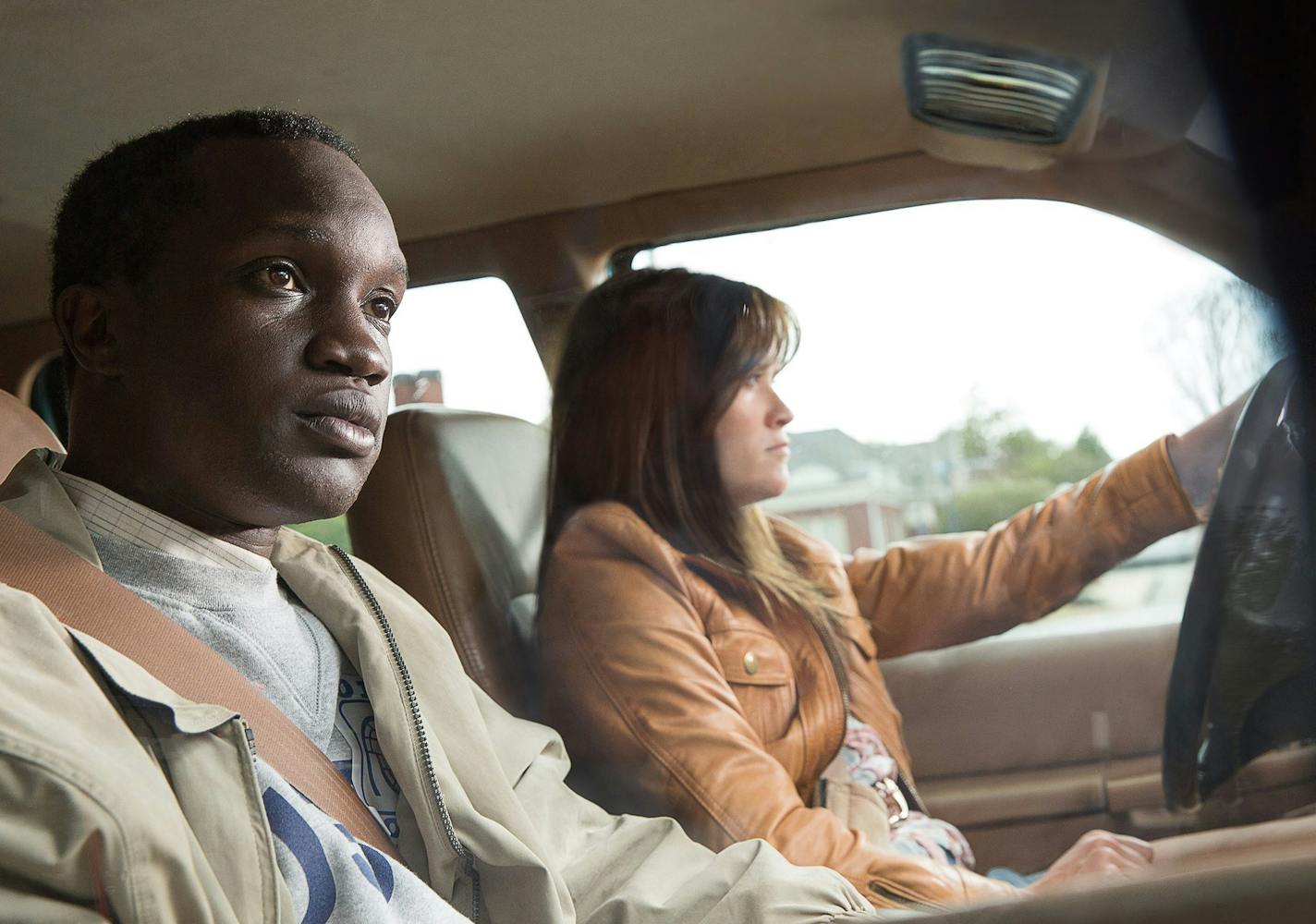 Arnold Oceng as Mamere and Reese Witherspoon as Carrie in "The Good Lie." (Photo courtesy Warner Bros./MCT) ORG XMIT: 1158058