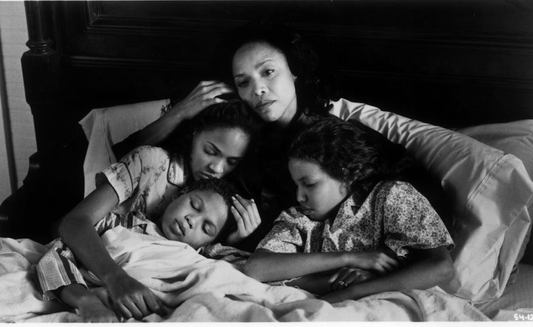 Lynn Whitfield stars as Roz Batiste and her children are portrayed by Meagan Good as Cisely, Jake Smollet as Poe and Jurnee Smollet as Eve in the 1997 movie 'Eve's Bayou.'