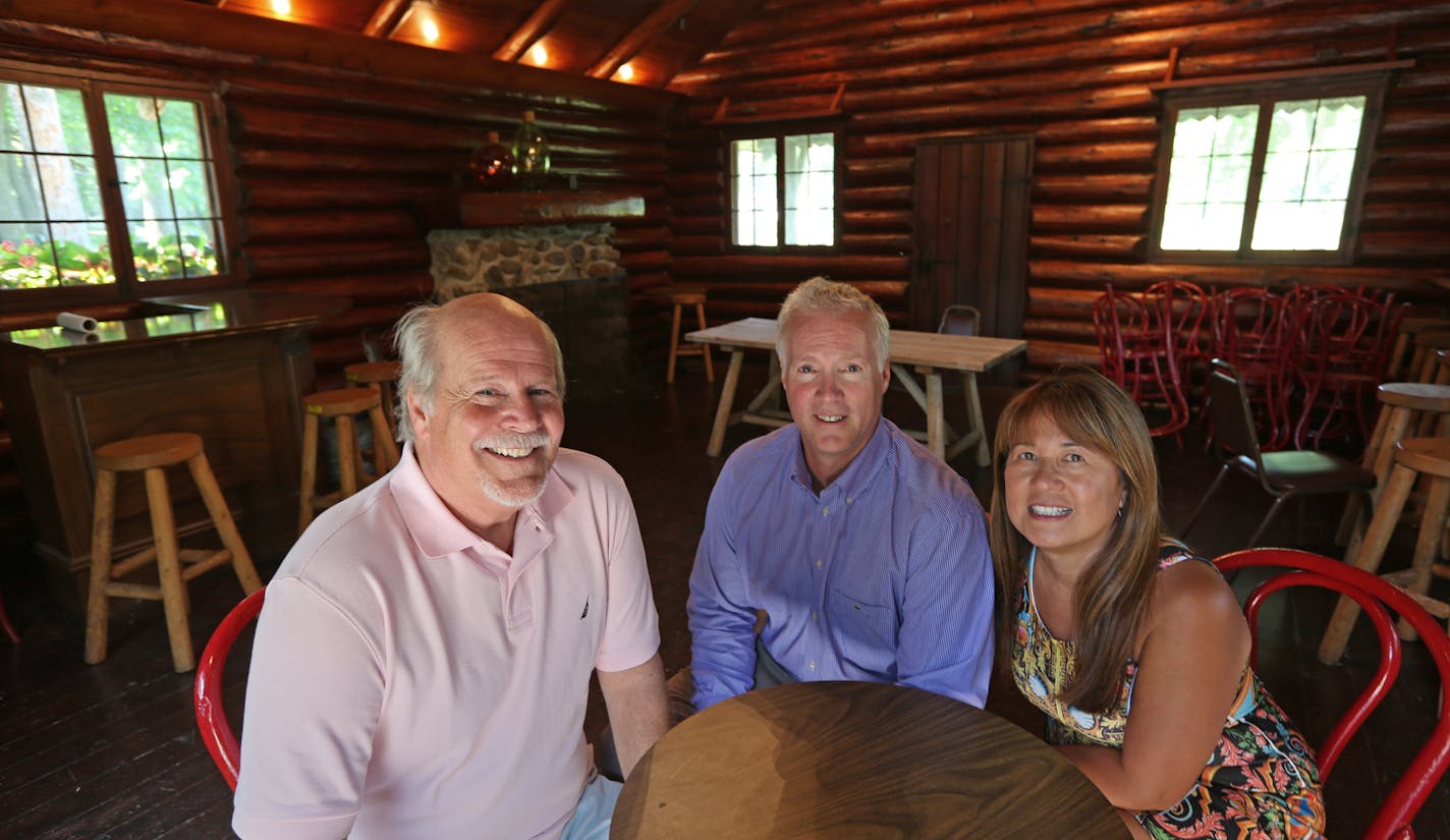 (left to right) Old Log Theatre Artistic Director Kent Knutson and The Old Log Theatre owners, Greg and Marissa Frankenfield were photographed in the cabin at the Theatre on 7/10/13. The Old Log makes the transition from the Don Stolz era to the Greg Frankenfield era. The new owner, with artistic director Kent Knutson, is freshening the programming and spending half a million dollars in upgrading the Twin Cities oldest existing theater.] Bruce Bisping/Star Tribune bbisping@startribune.com Mariss