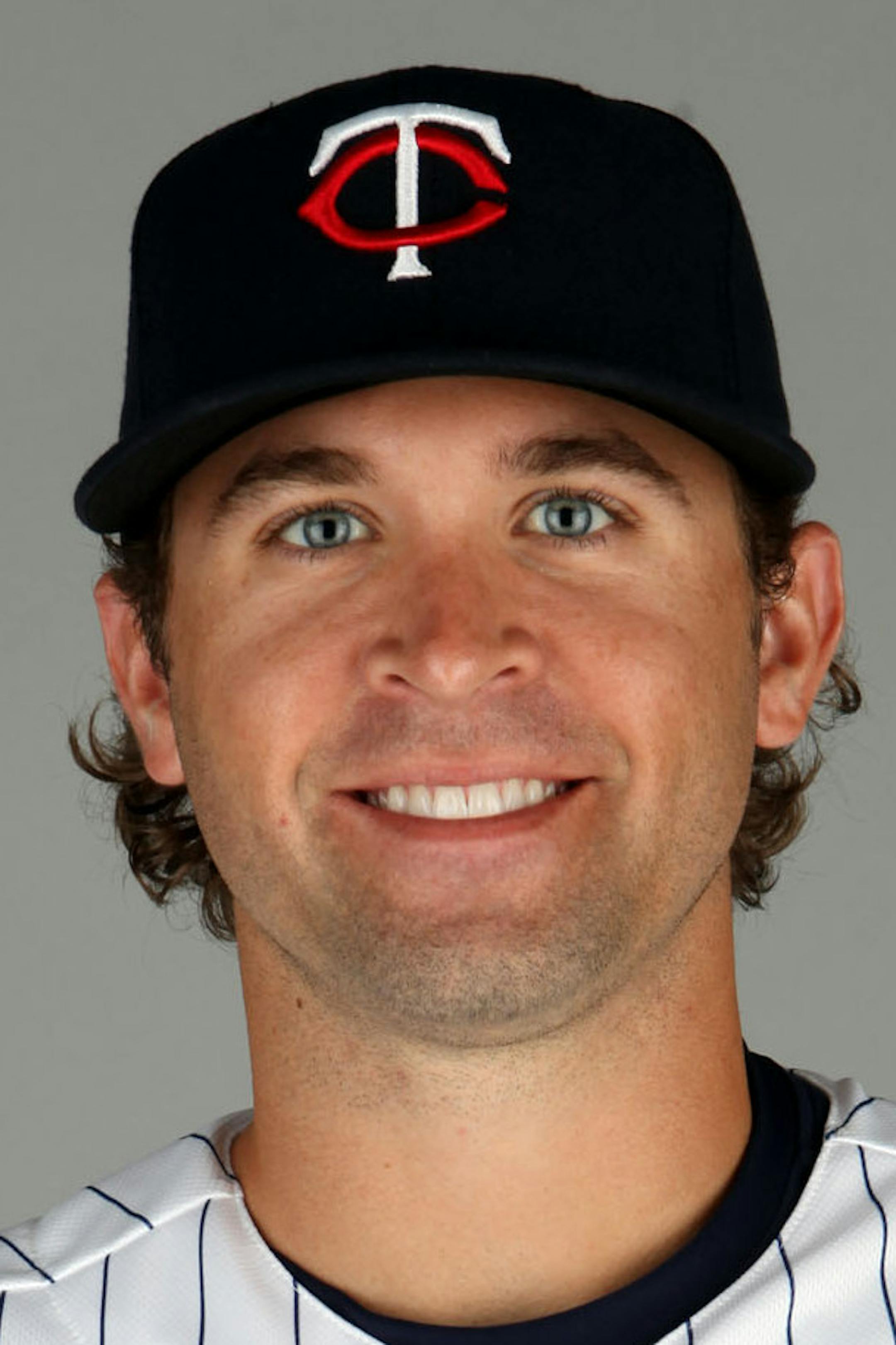 FORT MYERS, FL - FEBRUARY 27: Brian Dozier (77) of the Minnesota Twins poses during Photo Day on Monday, February 27, 2012 at Hammond Stadium in Fort Myers, Florida. (Photo by Eliot J. Schechter/MLB Photos via Getty Images) *** Local Caption *** Brian Dozier ORG XMIT: 137075938