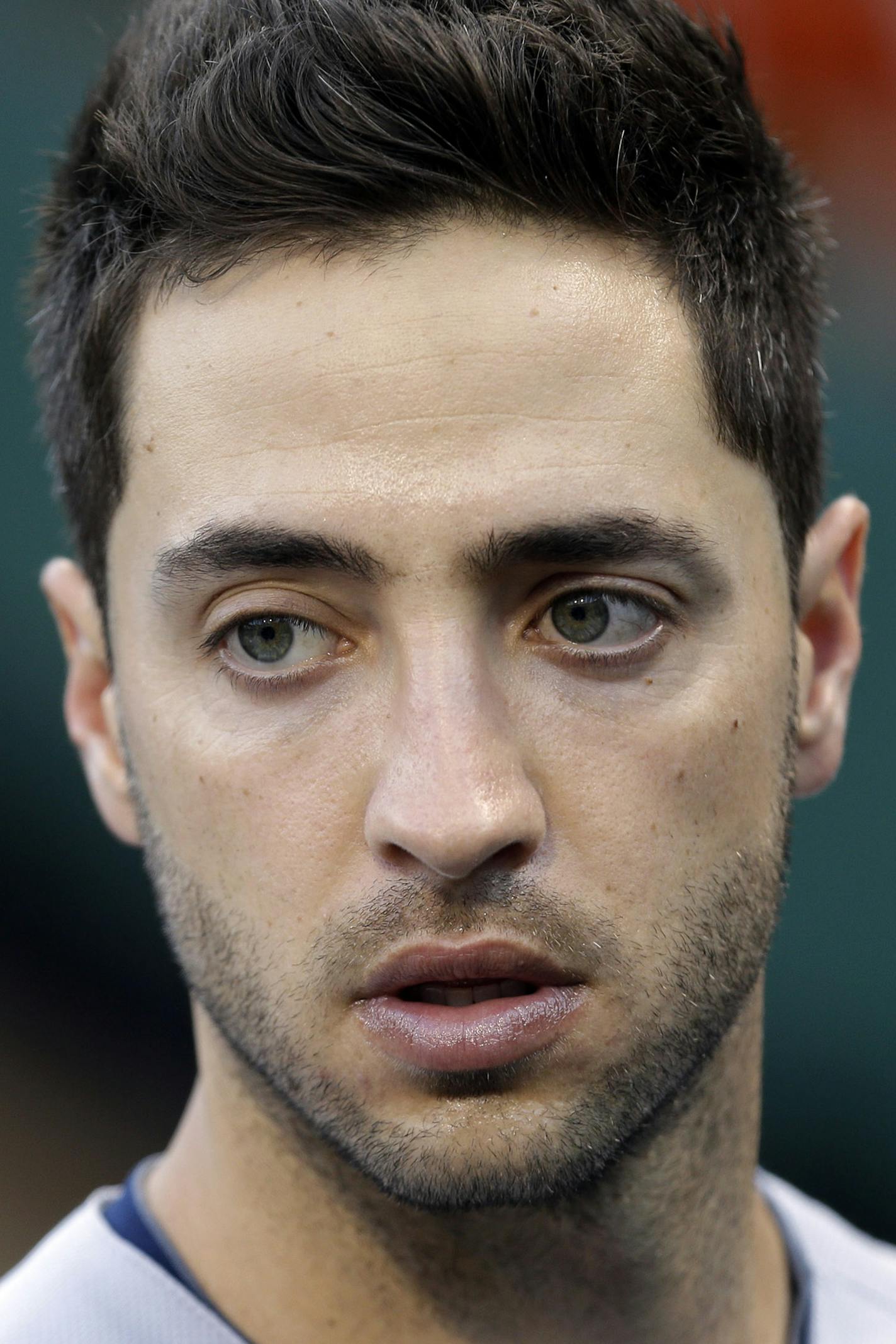 Milwaukee Brewers' Ryan Braun walks in the dugout before a baseball game against the Pittsburgh Pirates in Pittsburgh, Thursday, May 16, 2013. (AP Photo/Gene J. Puskar) ORG XMIT: MIN2013060420291006