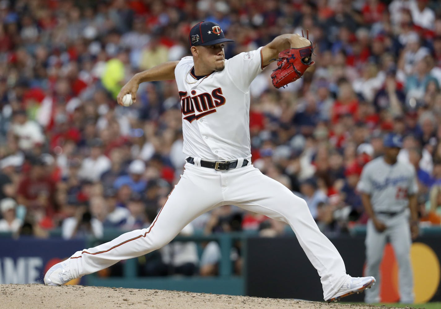 American League pitcher Jose Berrios, of the Minnesota Twins, throws during the third inning of the MLB baseball All-Star Game against the National League, Tuesday, July 9, 2019, in Cleveland. (AP Photo/John Minchillo)