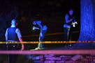 The Minneapolis Police Crime Lab Unit investigated the scene of Friday night's shooting in north Minneapolis, in which multiple people were reported s