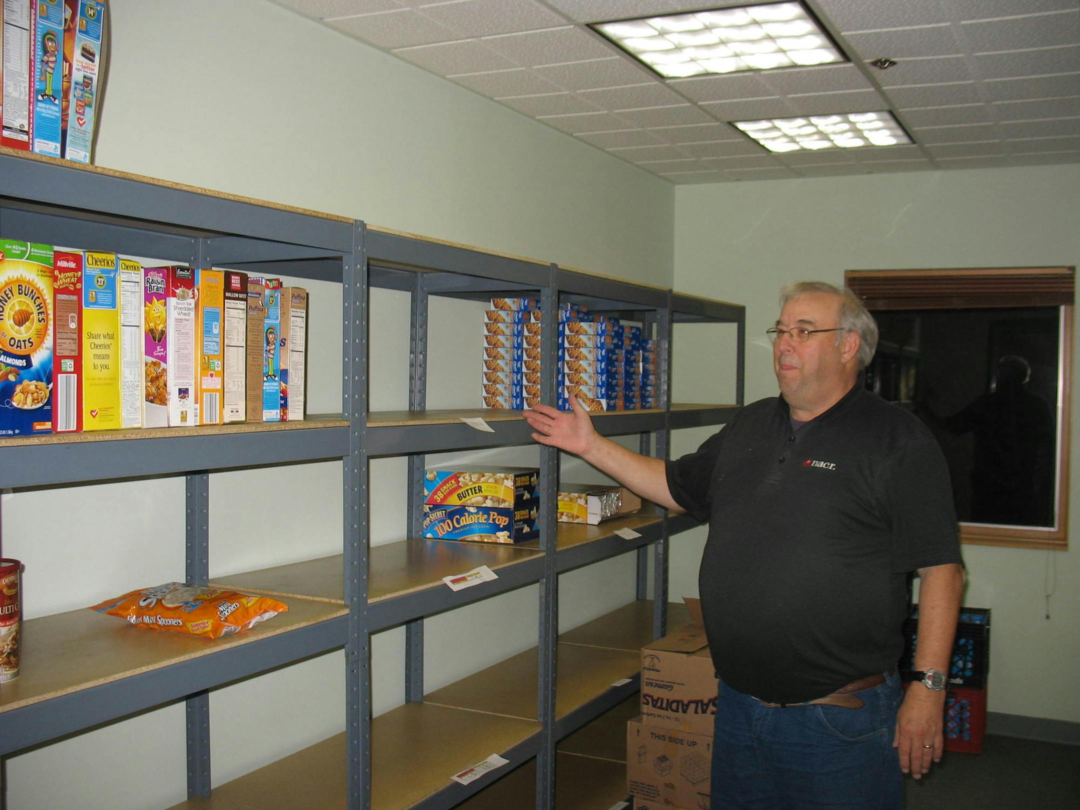 Ronald Koon, of the Centennial Community Food Shelf, inside the operation's new home in the former police station in Circle Pines. credit: Centennial Community Food Shelf