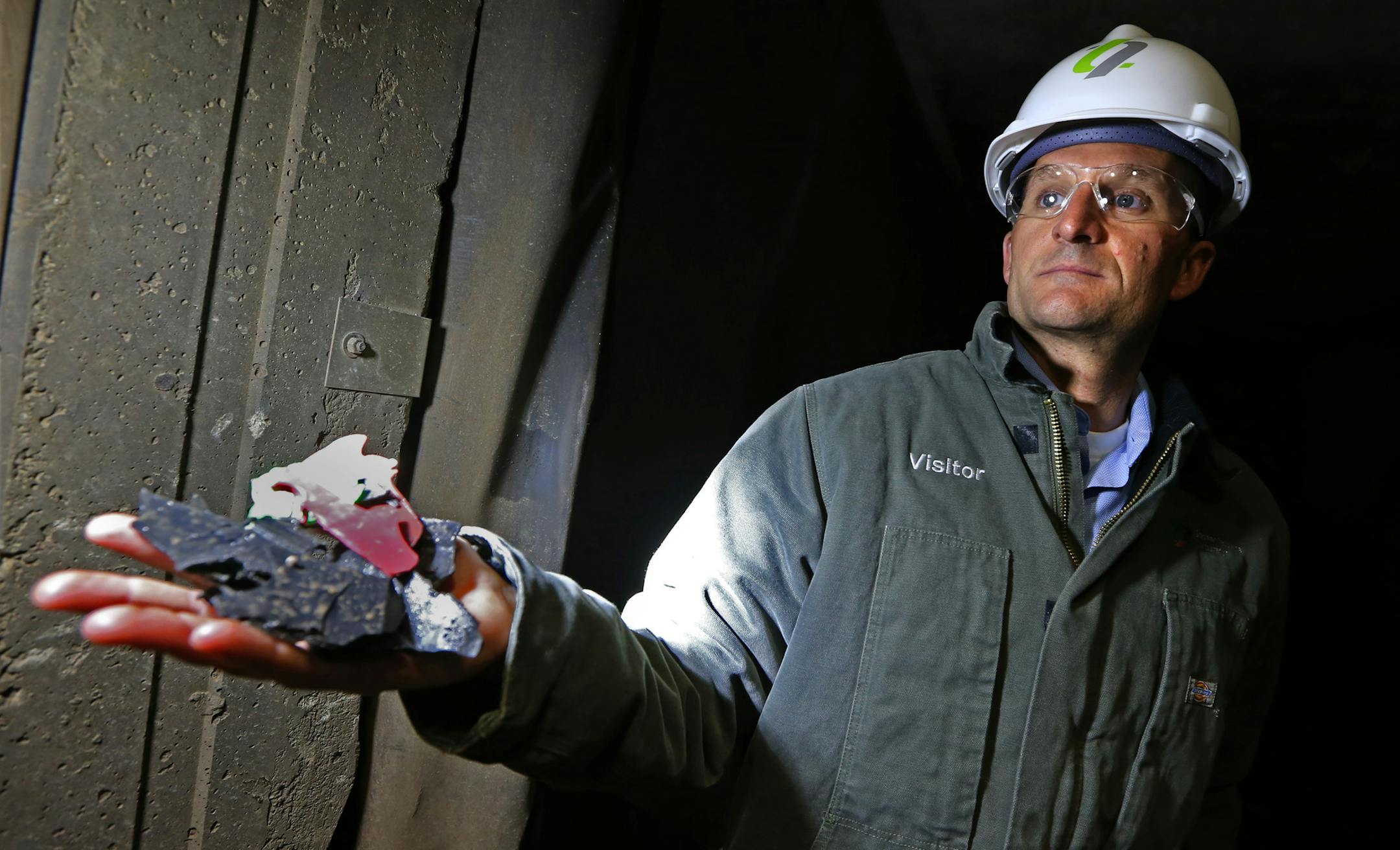 Daniel Leach, Gopher Resource Chief Business Development Officer held recycled plastic battery casing chips that would be futher processed into pellets for reuse. Eagan-based Gopher Resource recycles the lead and plastic out of millions of car/truck batteries a year (That equals 540 million pounds of lead and 30 million pounds of plastic each year.) Gopher Resource has plants in Eagan, Mn. and Florida. The company added 72 workers last year in Minnesota, and just opened a Florida plant, and is i