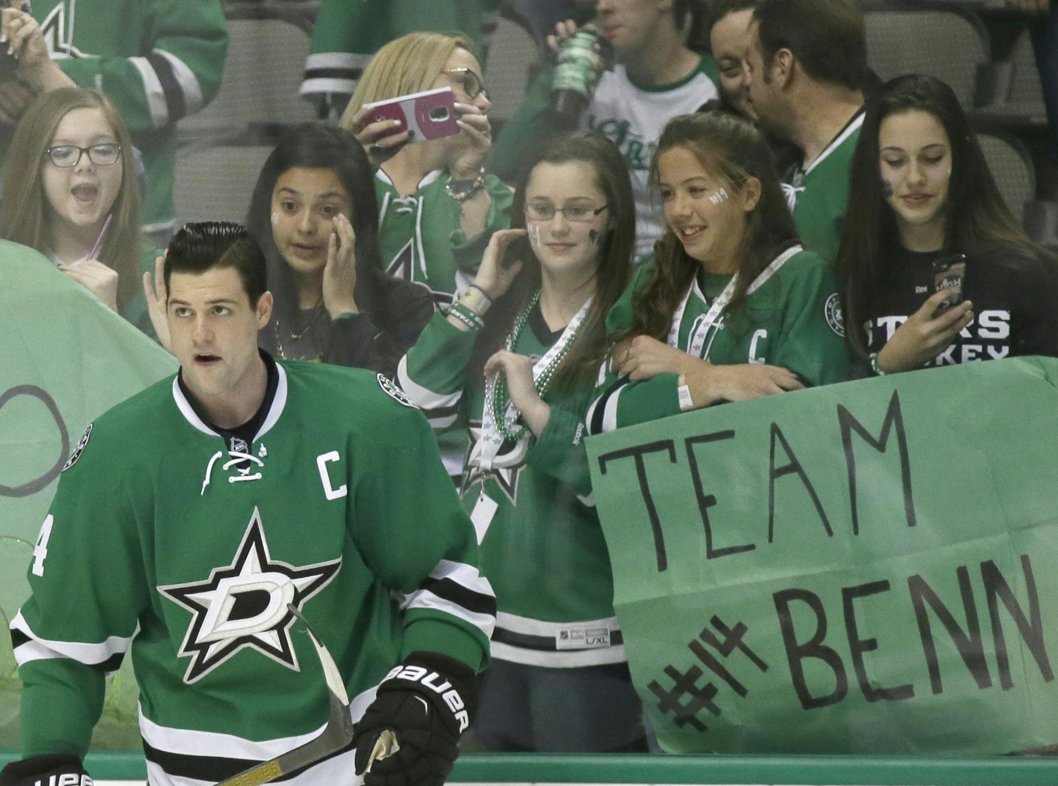 FILE - In this March 4, 2016, file photo, Dallas Stars left wing Jamie Benn (14) skates the ice during warm-ups before an NHL hockey game against the New Jersey Devils in Dallas. Benn always seems uncomfortable in the spotlight, even after general manager Jim Nill and coach Lindy Ruff made him the captain soon after they arrived in Dallas in 2013. He's growing into the role, and the Stars are the top seed in the Western Conference for the first time since Mike Modano was the face of the franchis
