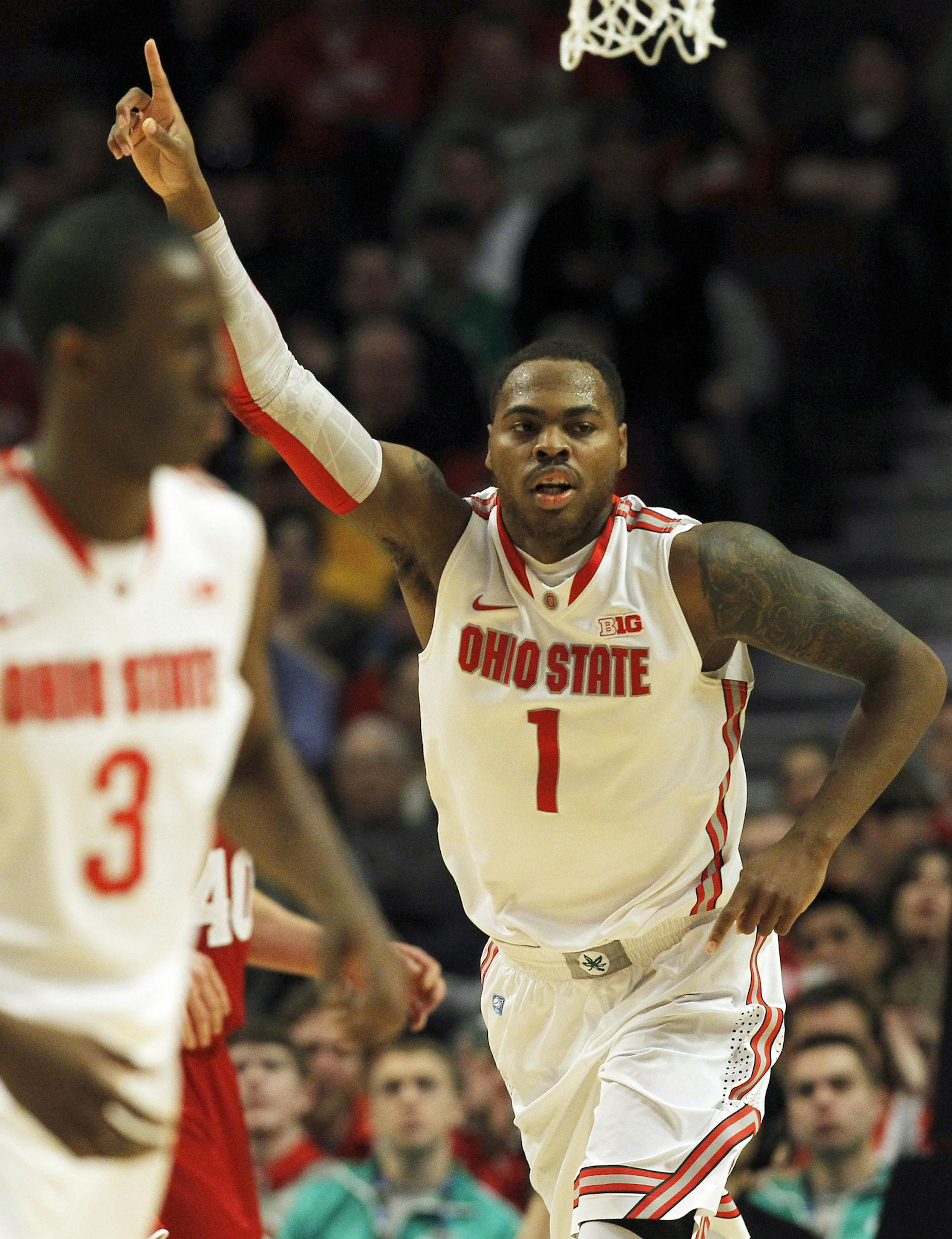 Ohio State Buckeyes forward Deshaun Thomas (1) celebrates after scoring against Wisconsin during the first half in the finals of the men's Big Ten basketball tournament at the United Center in Chicago, Illinois, Sunday, March 17, 2013. Buckeyes win, 50-43. (Jose M. Osorio/Chicago Tribune/MCT) ORG XMIT: 1136251