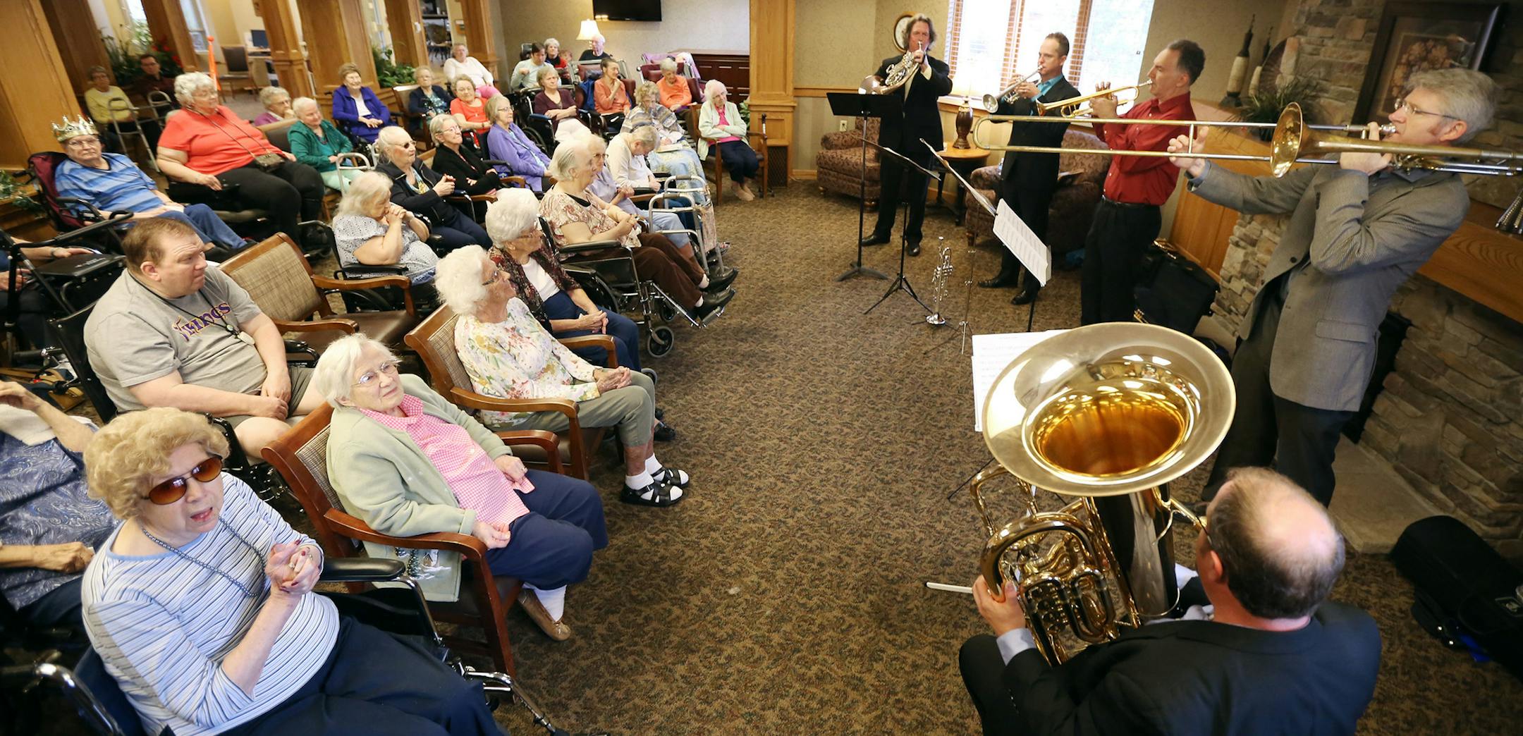 Members of the Minnesota Orchestra brass quintet left to right Michael Gast , Charles Lazurus , Robert Dorer, R.Douglas Wright , and Steven Campbell performed for residents at Essentia&#xed;s Oak Crossing Nursing Home Wednesday September 23, 2015 in Detroit Lakes, MN. ] This is the fifth year the Orchestra has descended upon a Minnesota town with a week of residencies, presentations, workshops and concerts that conclude with a major show Saturday. Common Chords is a way for the orchestra to prom