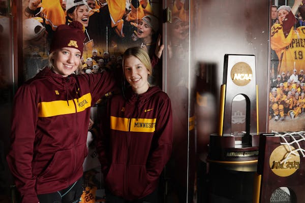 Sisters Amy and Sarah Potomak stood for a portrait Tuesday at Ridder Arena. ] ANTHONY SOUFFLE &#x2022; anthony.souffle@startribune.com Sisters Amy and