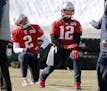 New England Patriots quarterbacks Tom Brady (12) and Brian Hoyer (2) warm up during an NFL football practice, Friday, Jan. 19, 2018, in Foxborough, Ma