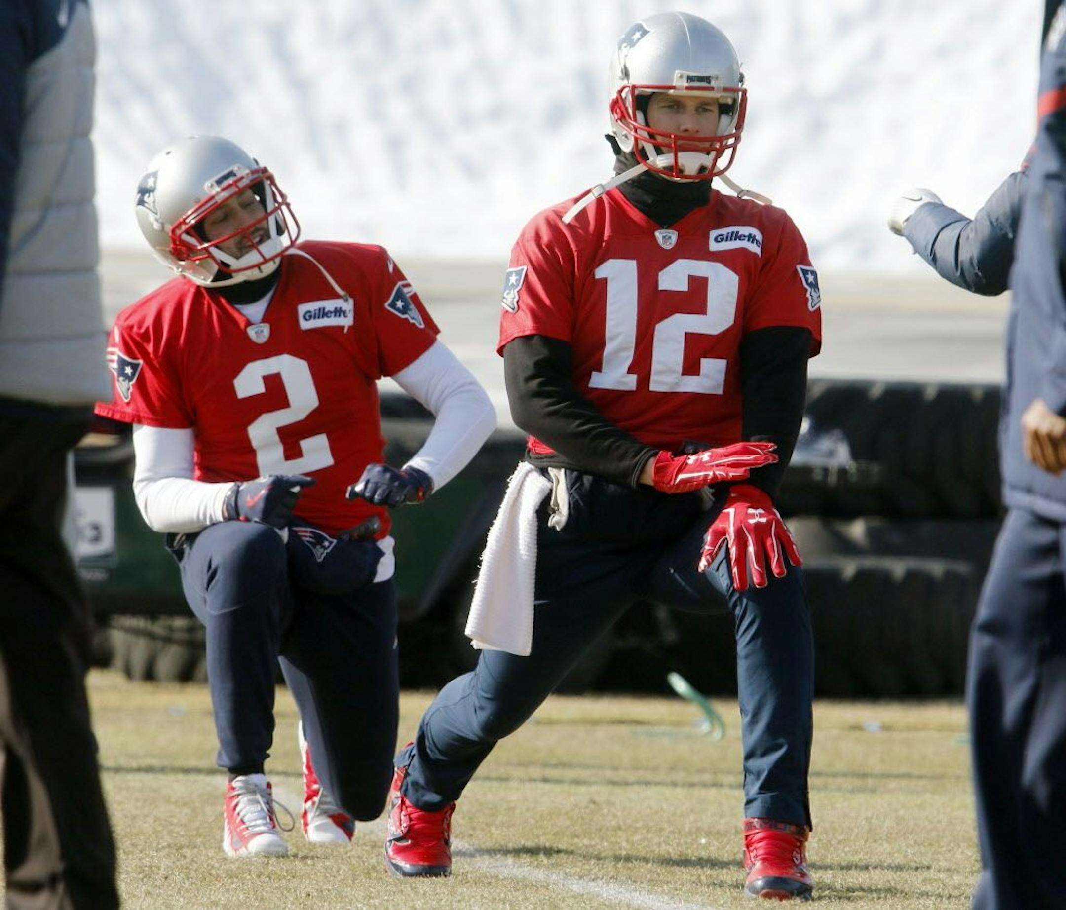 New England Patriots quarterbacks Tom Brady (12) and Brian Hoyer (2) warm up during an NFL football practice, Friday, Jan. 19, 2018, in Foxborough, Mass. The Patriots host the Jacksonville Jaguars in the AFC championship on Sunday in Foxborough.