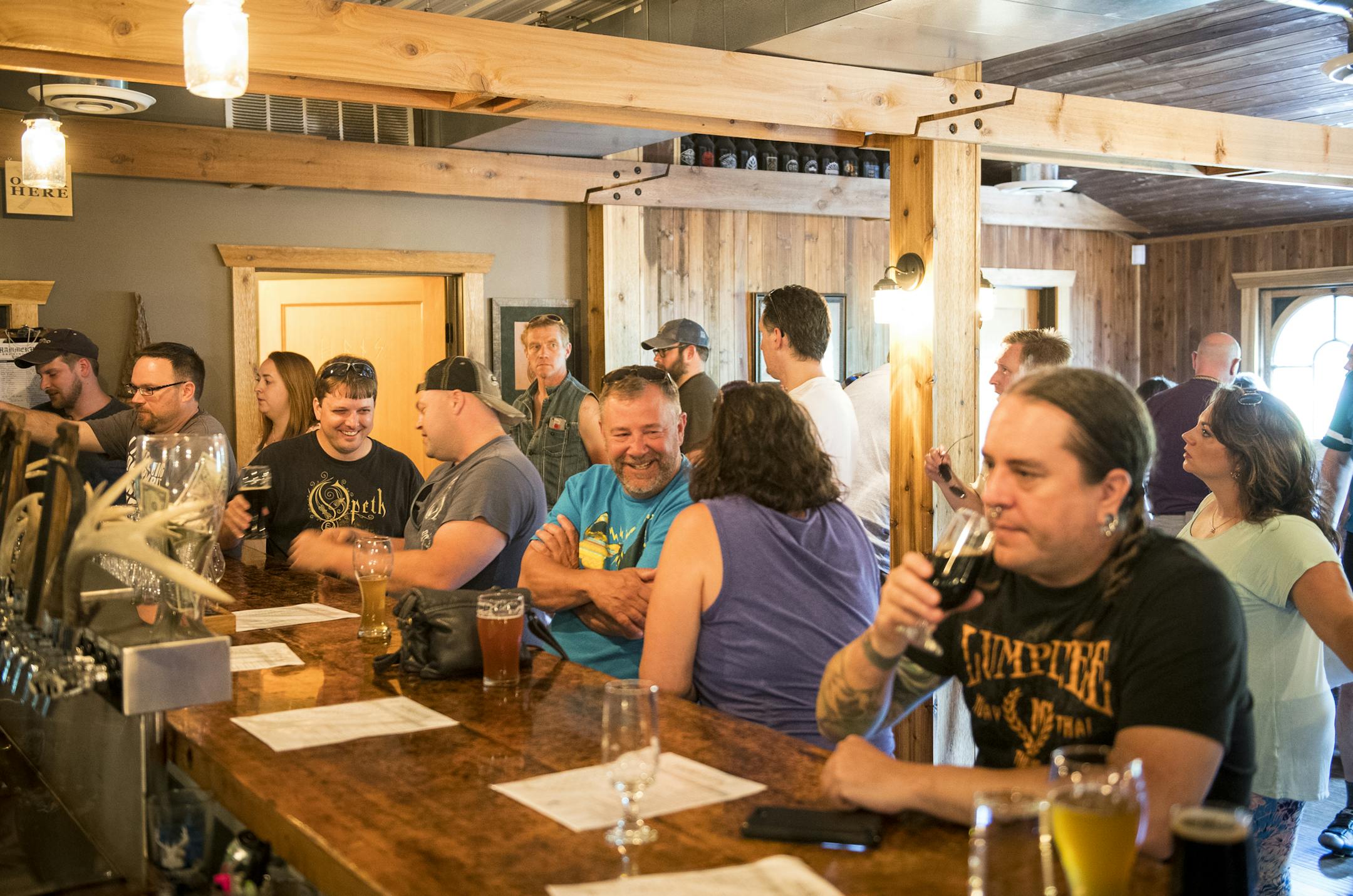 It’s a busy Saturday afternoon in Hammerheart Brewing’s taproom in Lino Lakes.