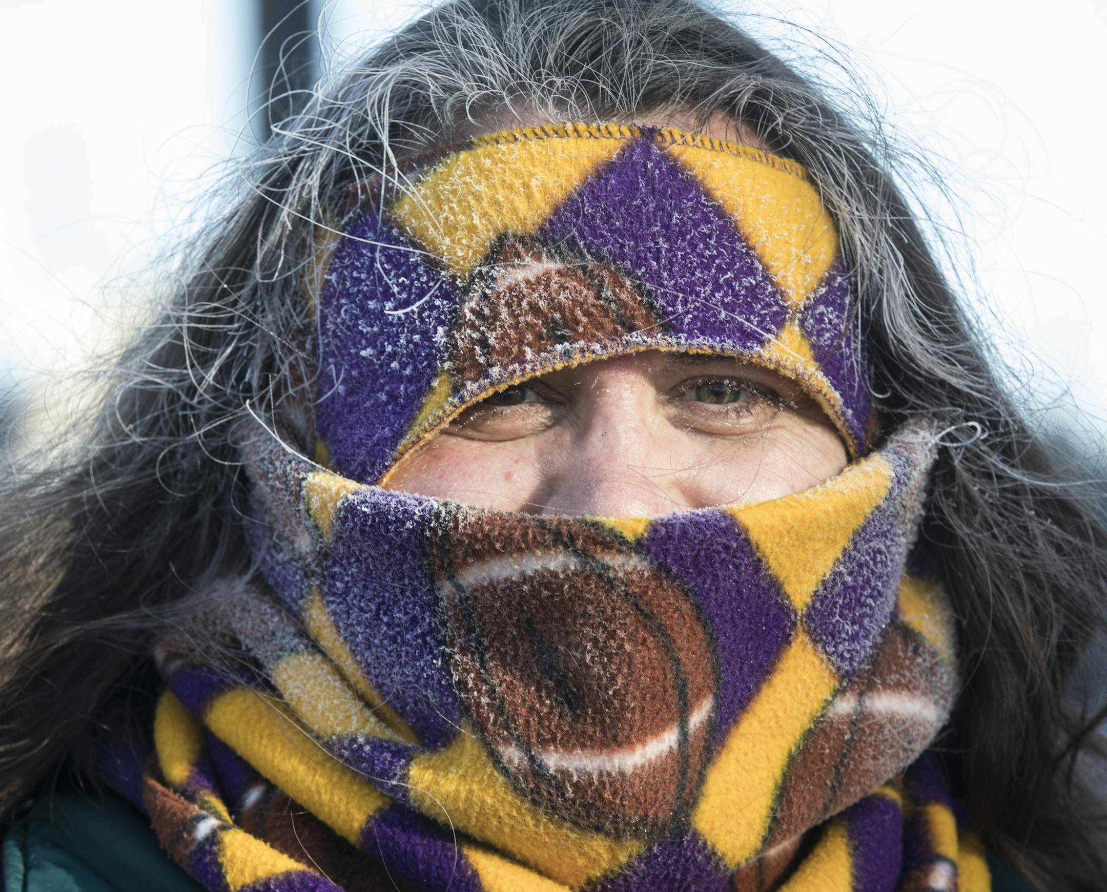 "I'm actually smiling under this," said long-time season ticket-holder Jennifer Bergan, of Forest Lake, through her frosty Vikings winter wear as she arrived at the last Minnesota Vikings regular season game at U.S. Bank Stadium on Sunday, Dec. 31, 2017, in Minneapolis.