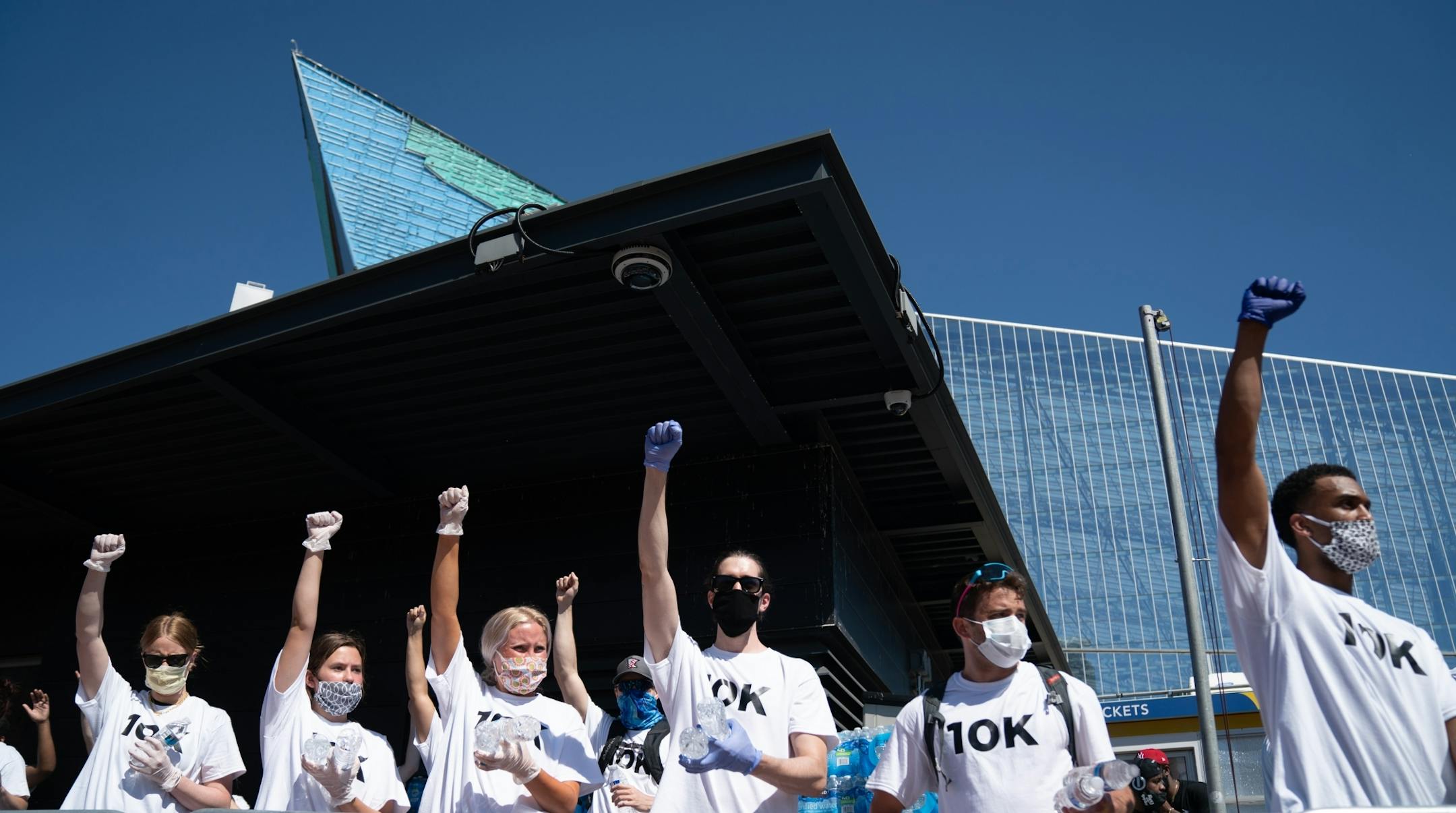 A rally called Unfinished Business, sponsored by the 10K foundation drew crowds starting from USBank Stadium and then marched toward downtown. The group gave out free water to the crowd.