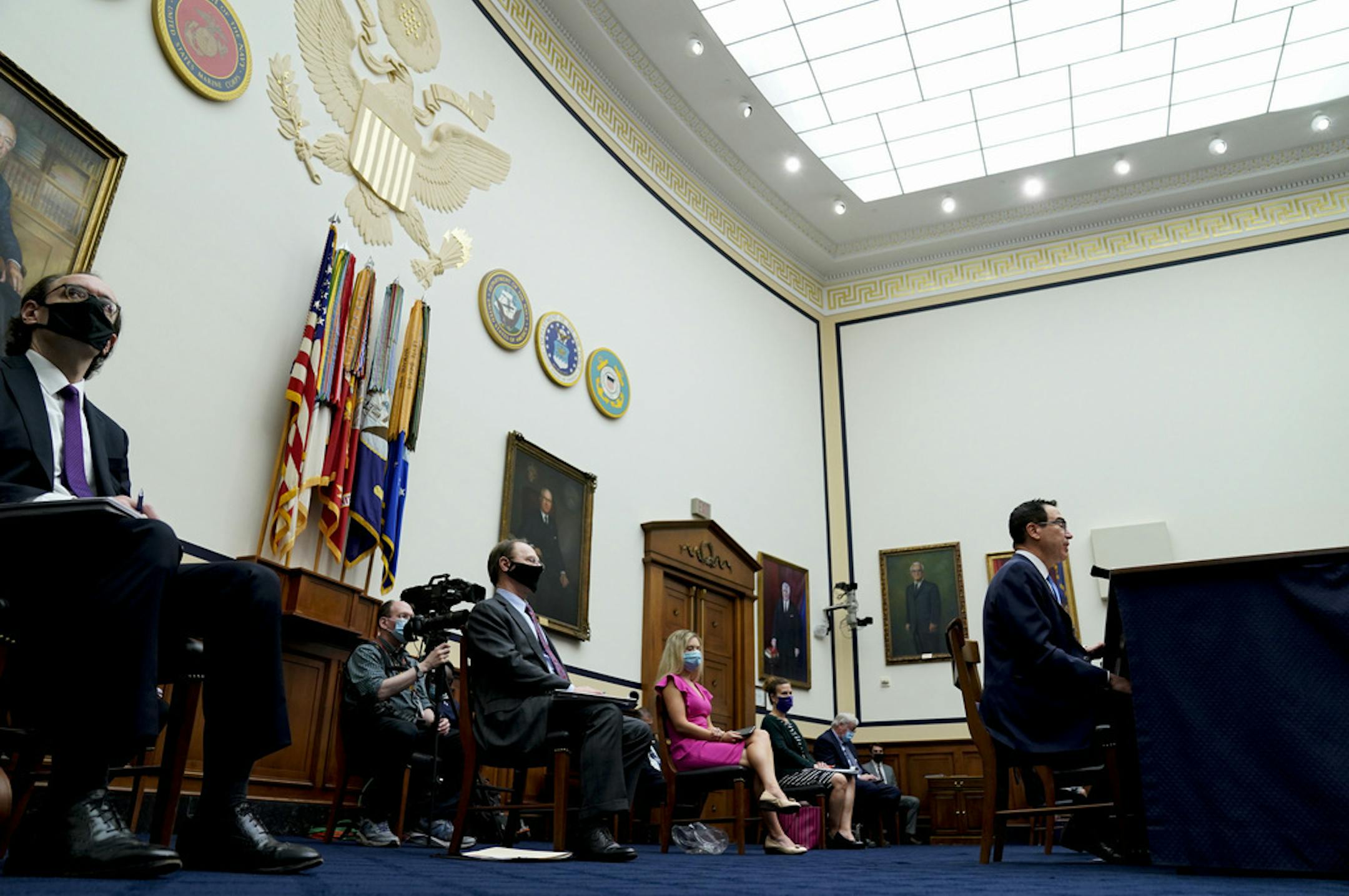 Treasury Secretary Steven Mnuchin speaks during a House Small Business Committee hearing on oversight of the Small Business Administration and Department of Treasury pandemic programs on Capitol Hill in Washington, Friday, July 17, 2020. (Erin Scott/Pool via AP)
