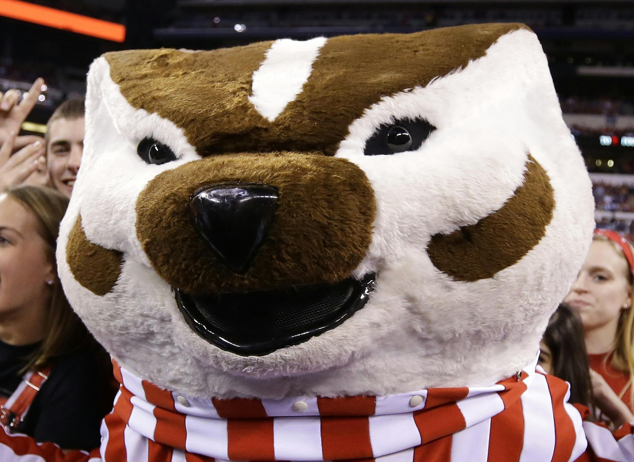 FILE - In this April 6, 2015, file photo, the Wisconsin mascot, Bucky the Badger, cheers with fans before the NCAA Final Four college basketball tournament championship game between Wisconsin and Duke in Indianapolis. Bucky the Badger is among the 10 pro and seven collegiate mascots that have been inducted into the Mascot Hall of Fame will be built in Whiting, Ind. (AP Photo/Michael Conroy, file) ORG XMIT: INMC208