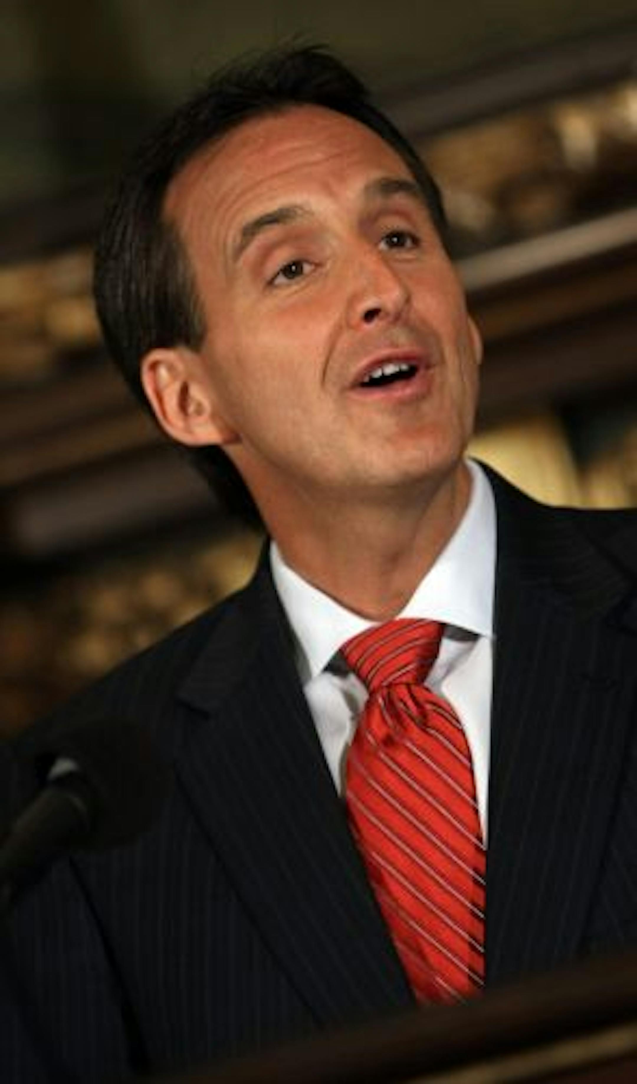 (left to right) Minnesota Governor Tim Pawlenty answered questions after announcing he would not seek a third term.